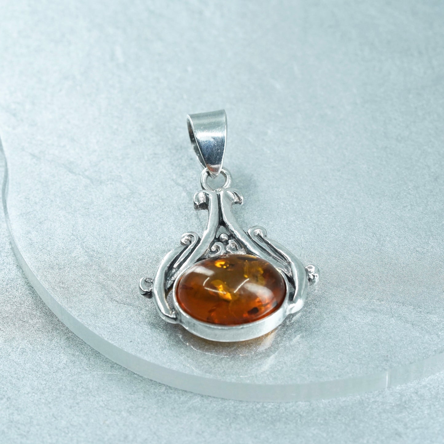 Vintage sterling 925 silver handmade pendant with oval amber
