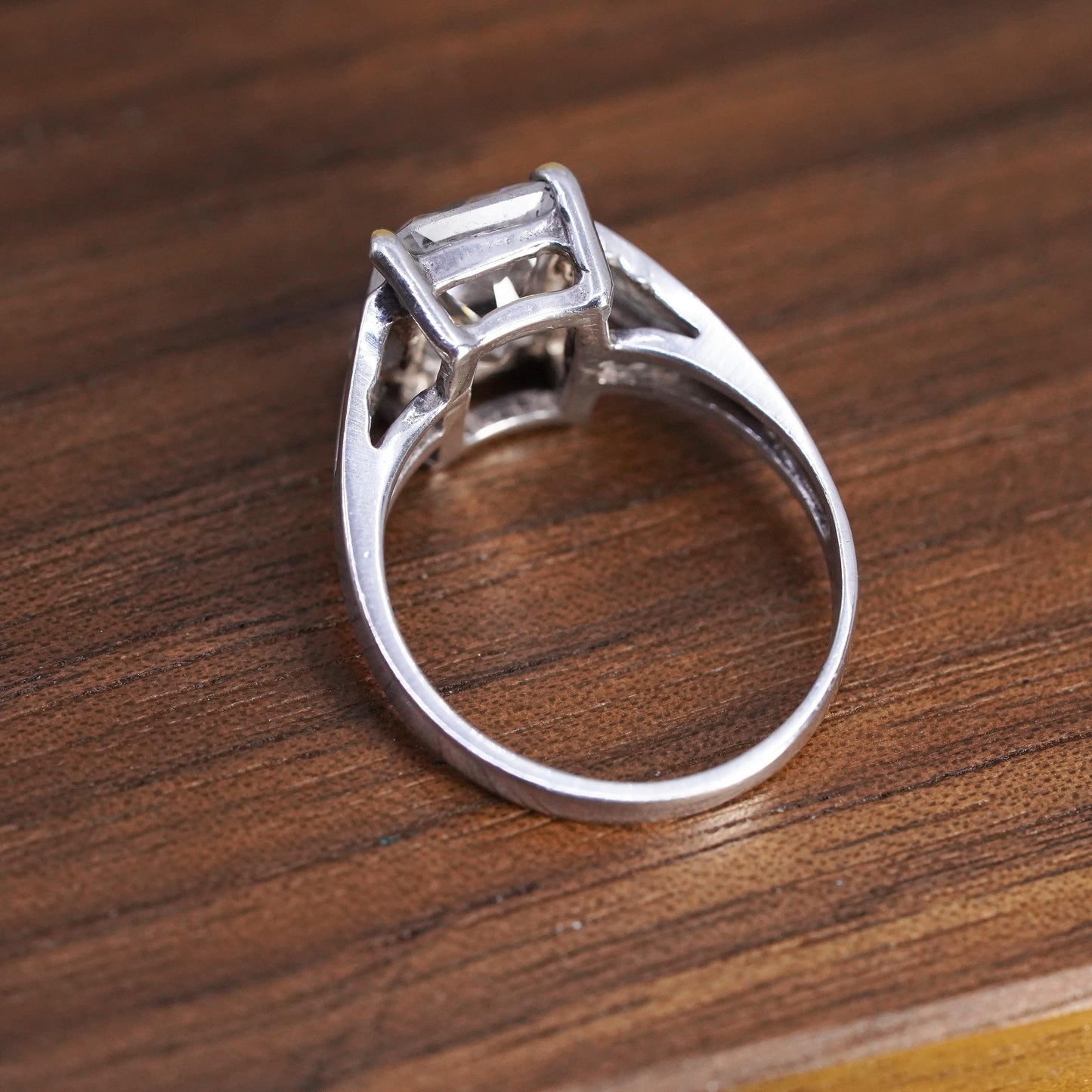 Size 7, vintage Sterling 925 silver anniversary ring with clear emerald cut cz