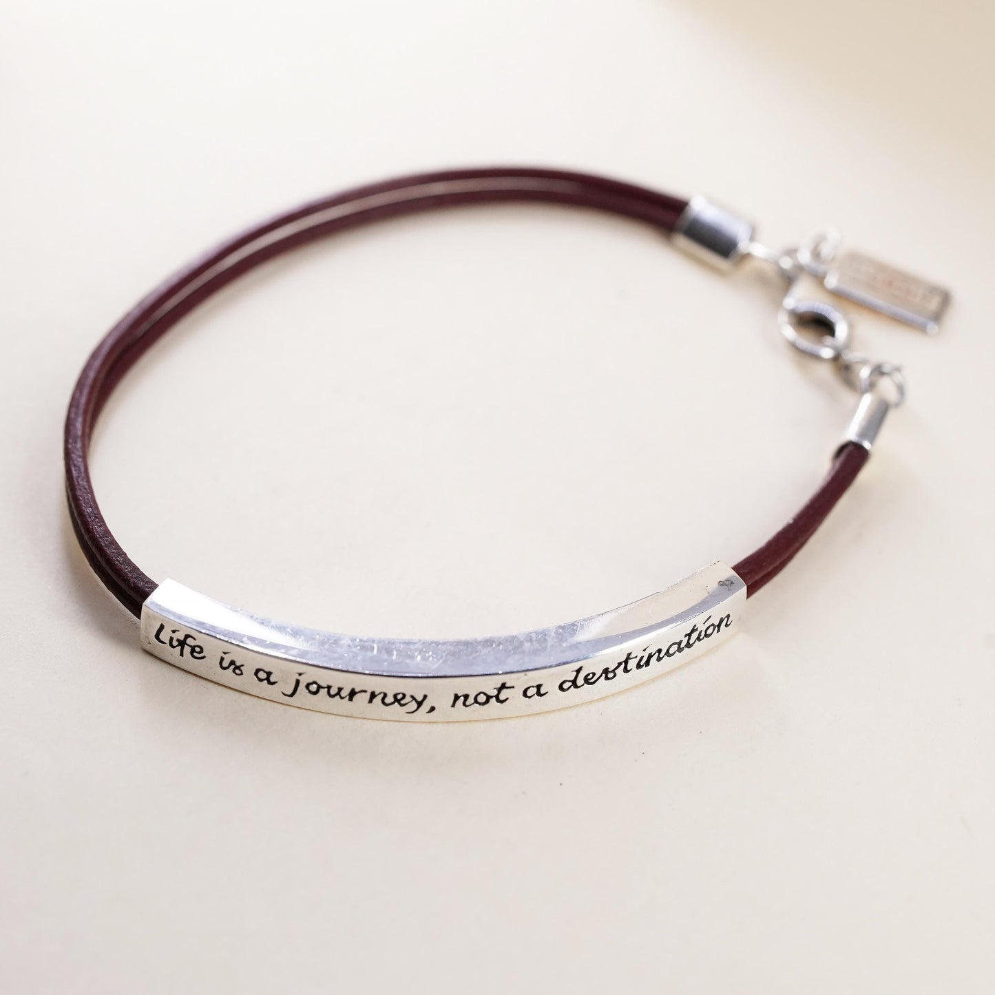7.5", Vintage Baroni brown leather strap with 925 Sterling silver quote bar