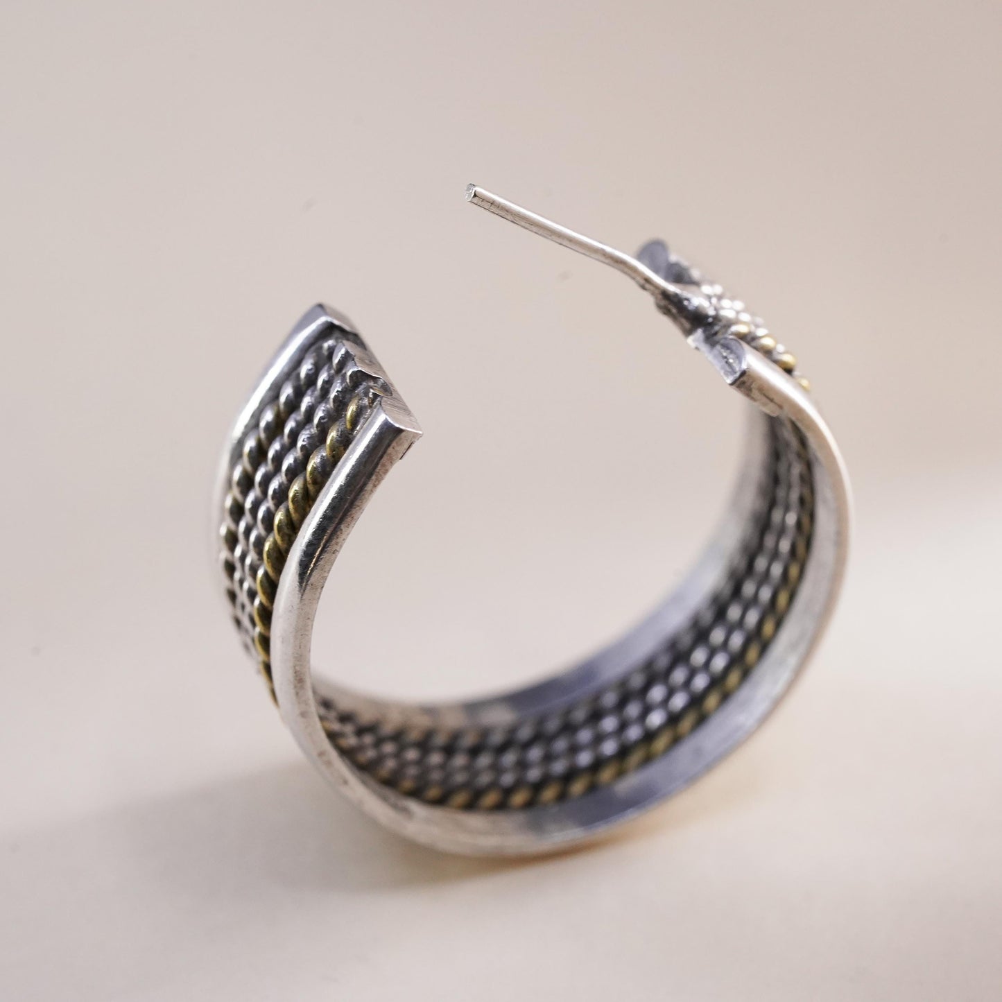 Vintage two tone Mexican single earring. Sterling 925 silver huggie stud