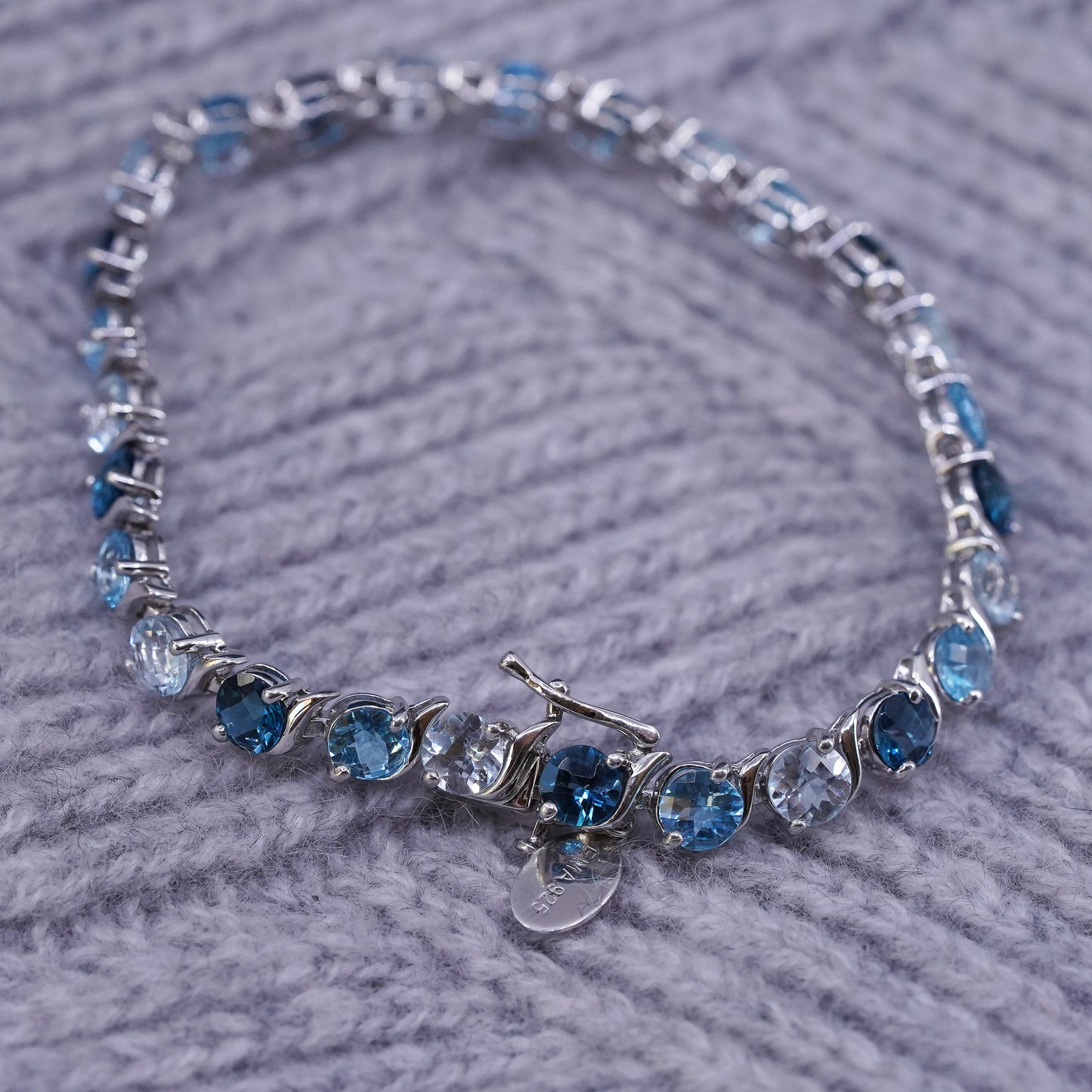 7", vintage Sterling 925 silver tennis bracelet with blue topaz