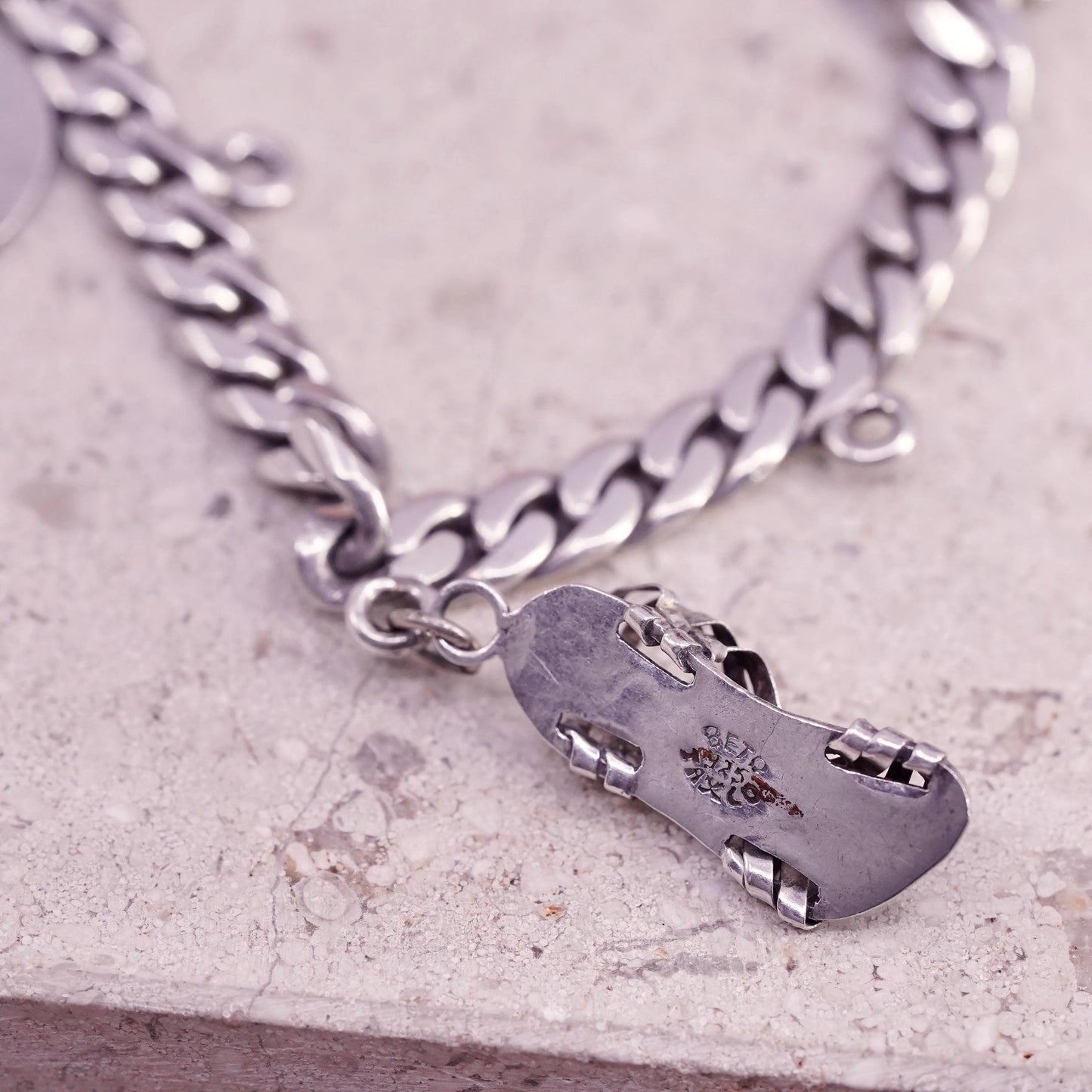 6.75” Castelan sterling silver bracelet, 925 curb chain 2 charms Mayan calendar