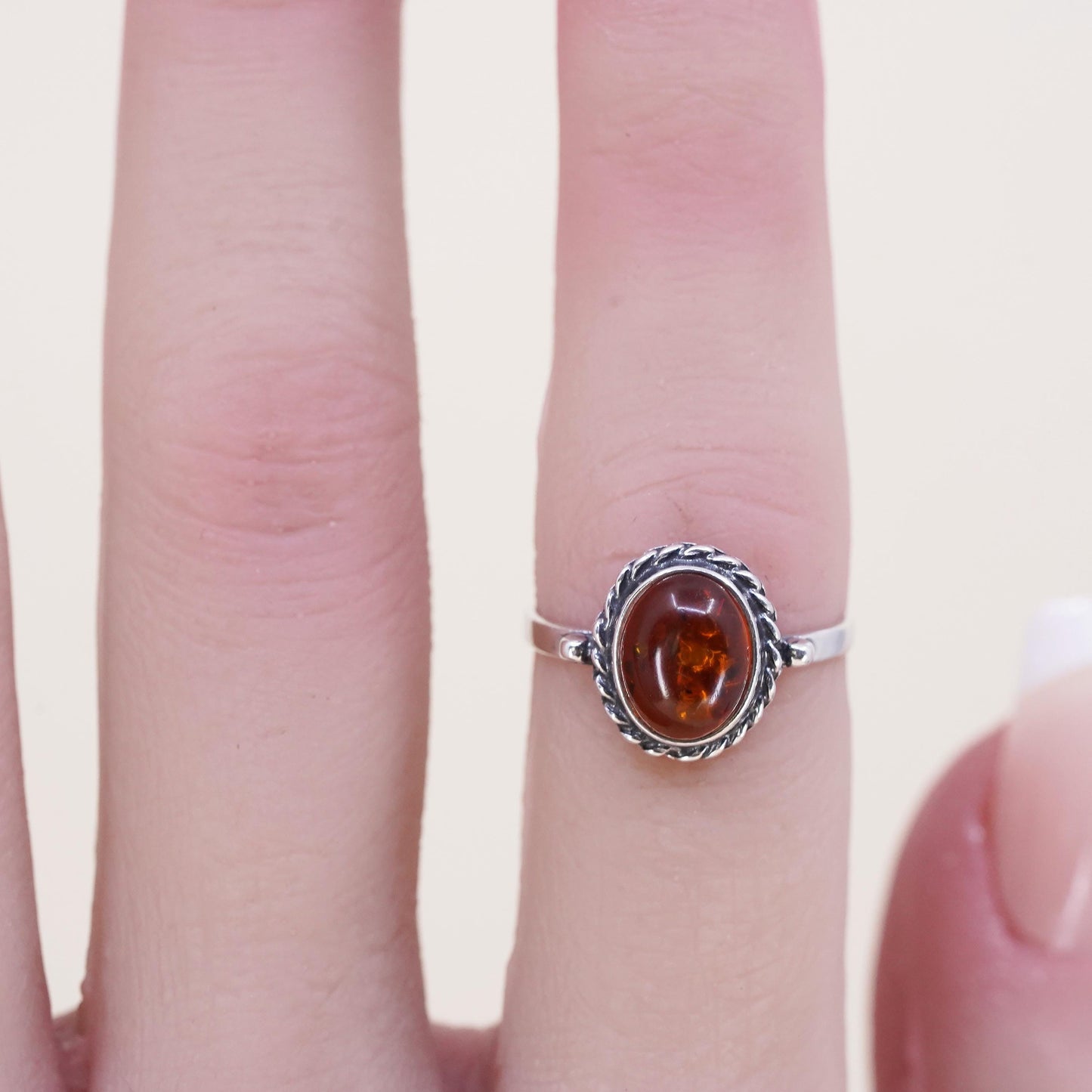 Size 5, Vintage sterling 925 silver handmade ring with Amber and cable around