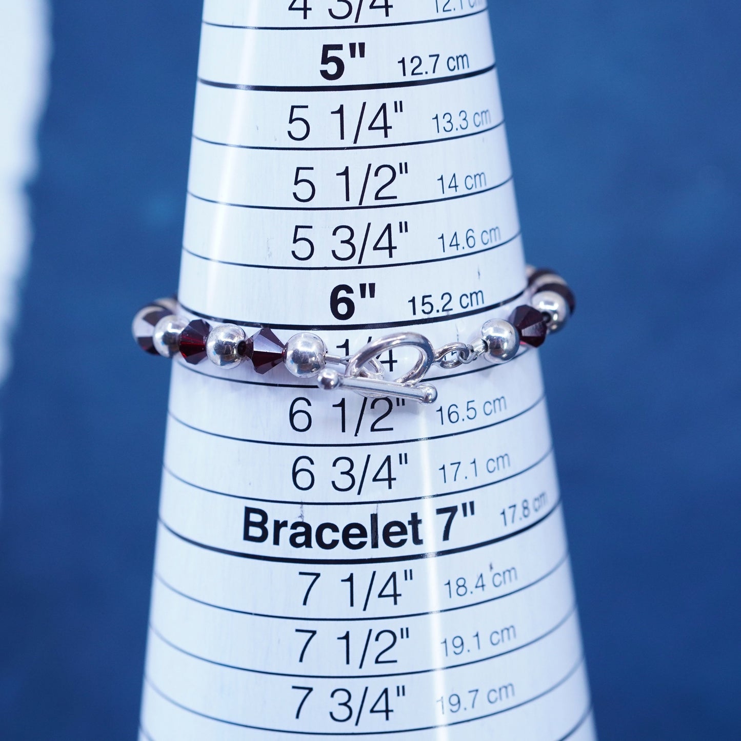 6.25”, sterling silver 925 bracelet with garnet beads and name “Kelly” cubes