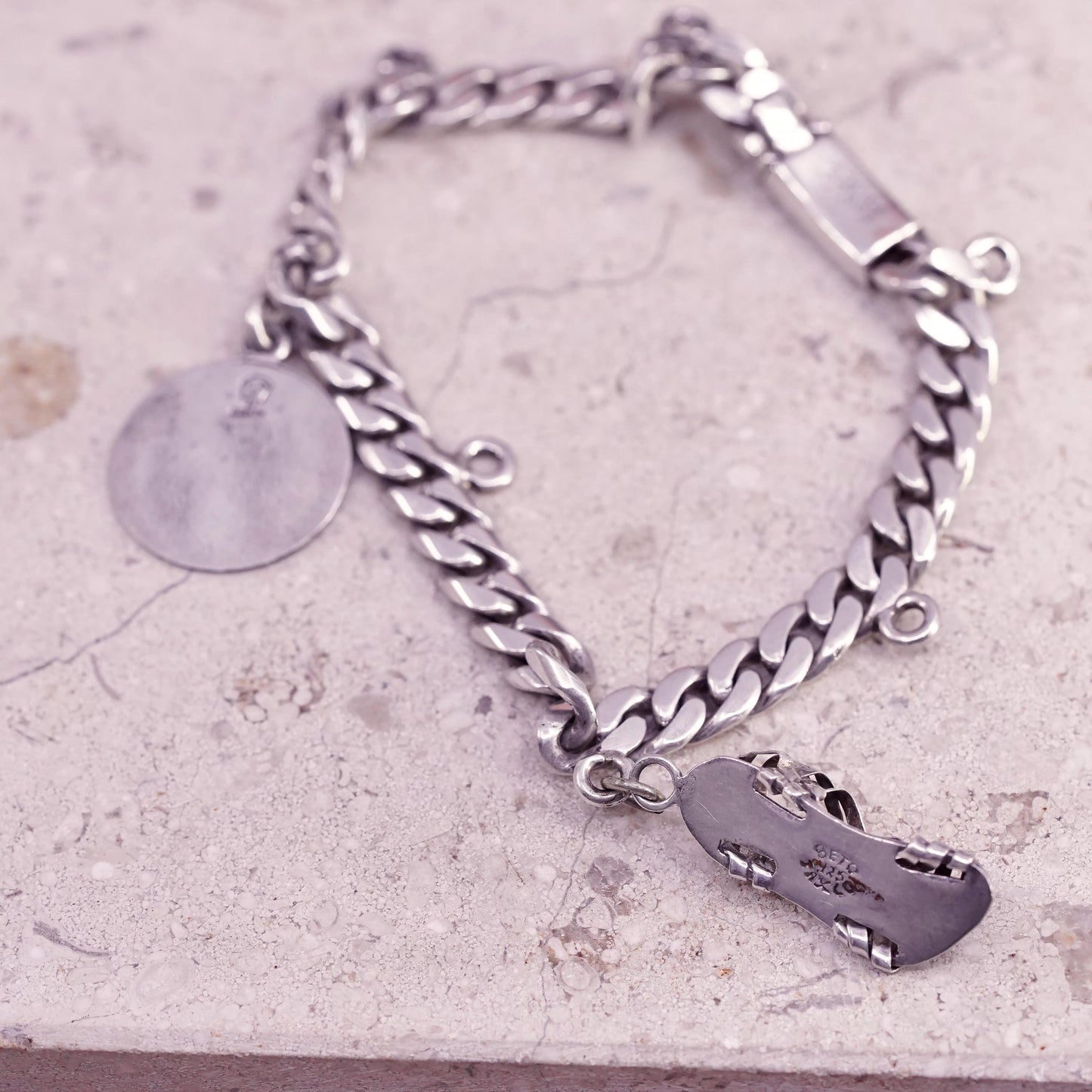 6.75” Castelan sterling silver bracelet, 925 curb chain 2 charms Mayan calendar
