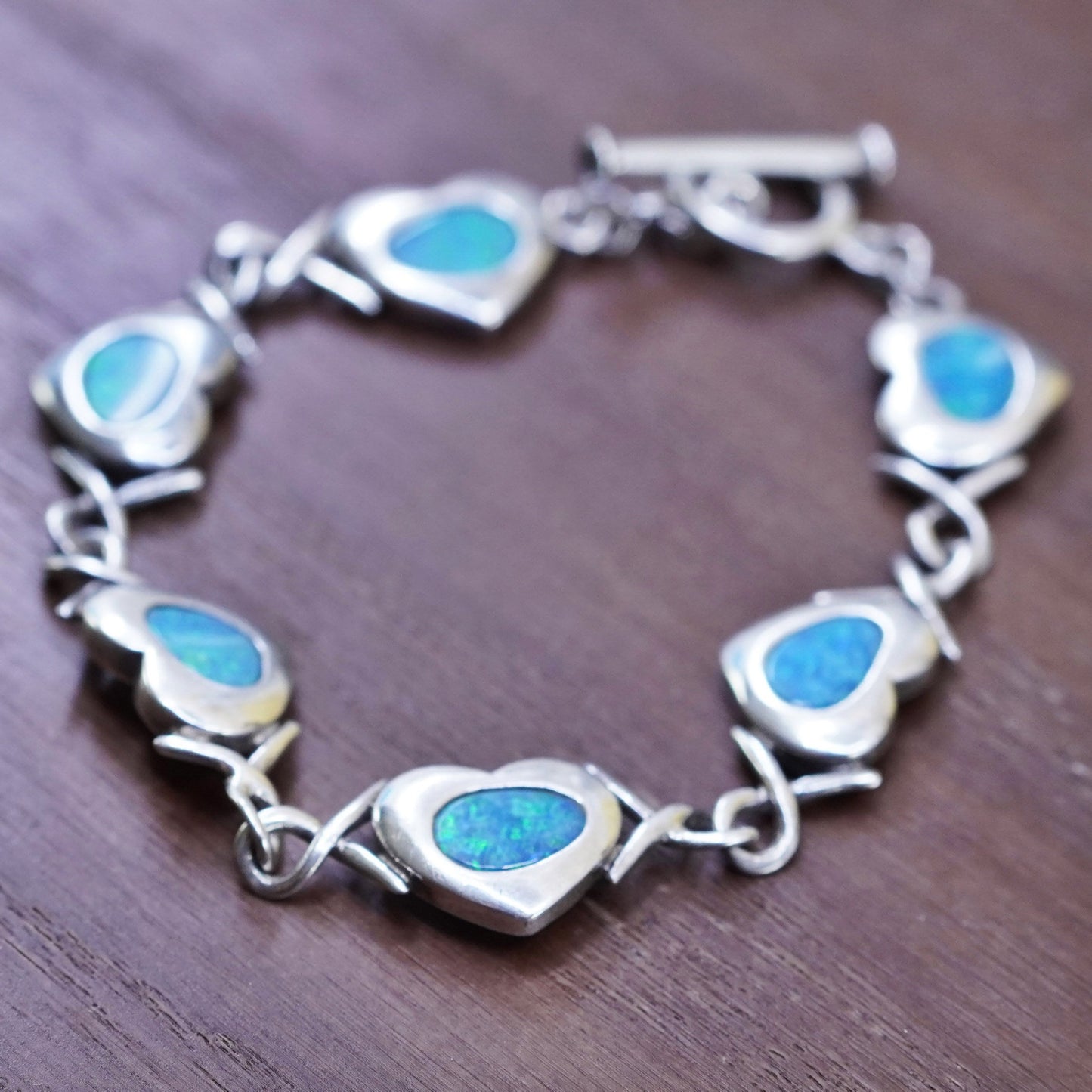 5.75”, vintage Sterling 925 silver heart chain bracelet w/ blue fire opal inlay