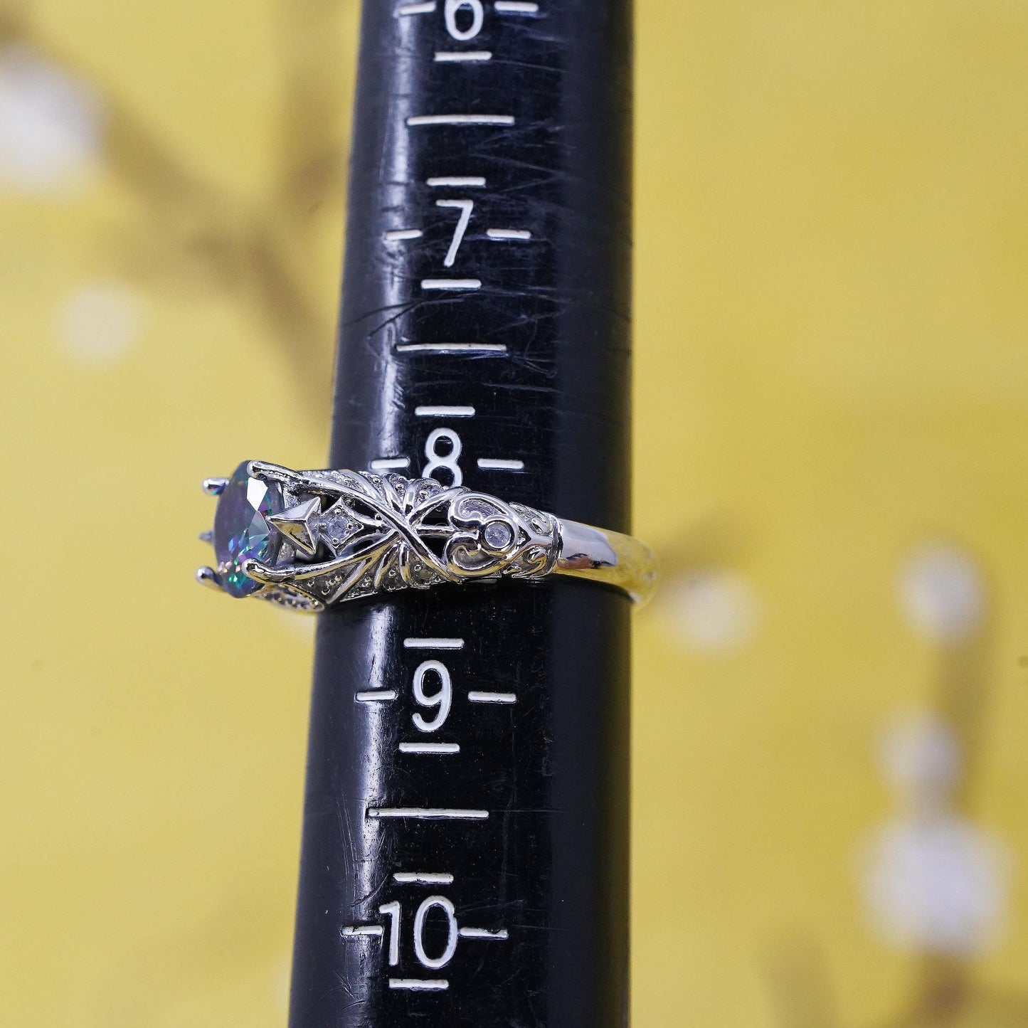 Size 8.25, vintage Sterling 925 silver ring with teardrop rainbow topaz cz