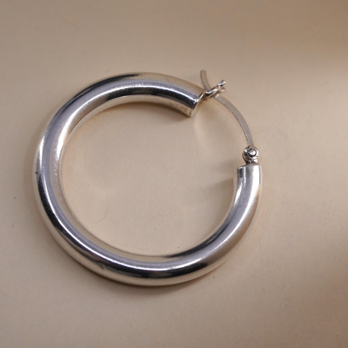 1.25” Vintage sterling silver loop single earring, textured primitive hoop