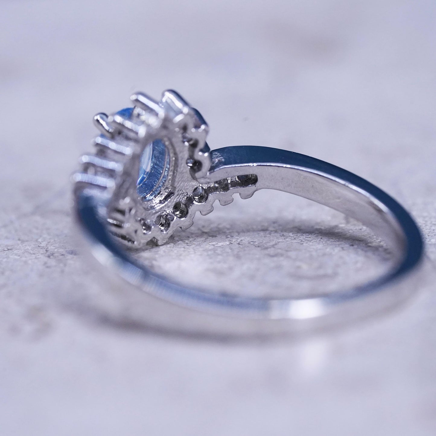Size 7, vintage sterling 925 silver handmade ring with blue topaz and cz around