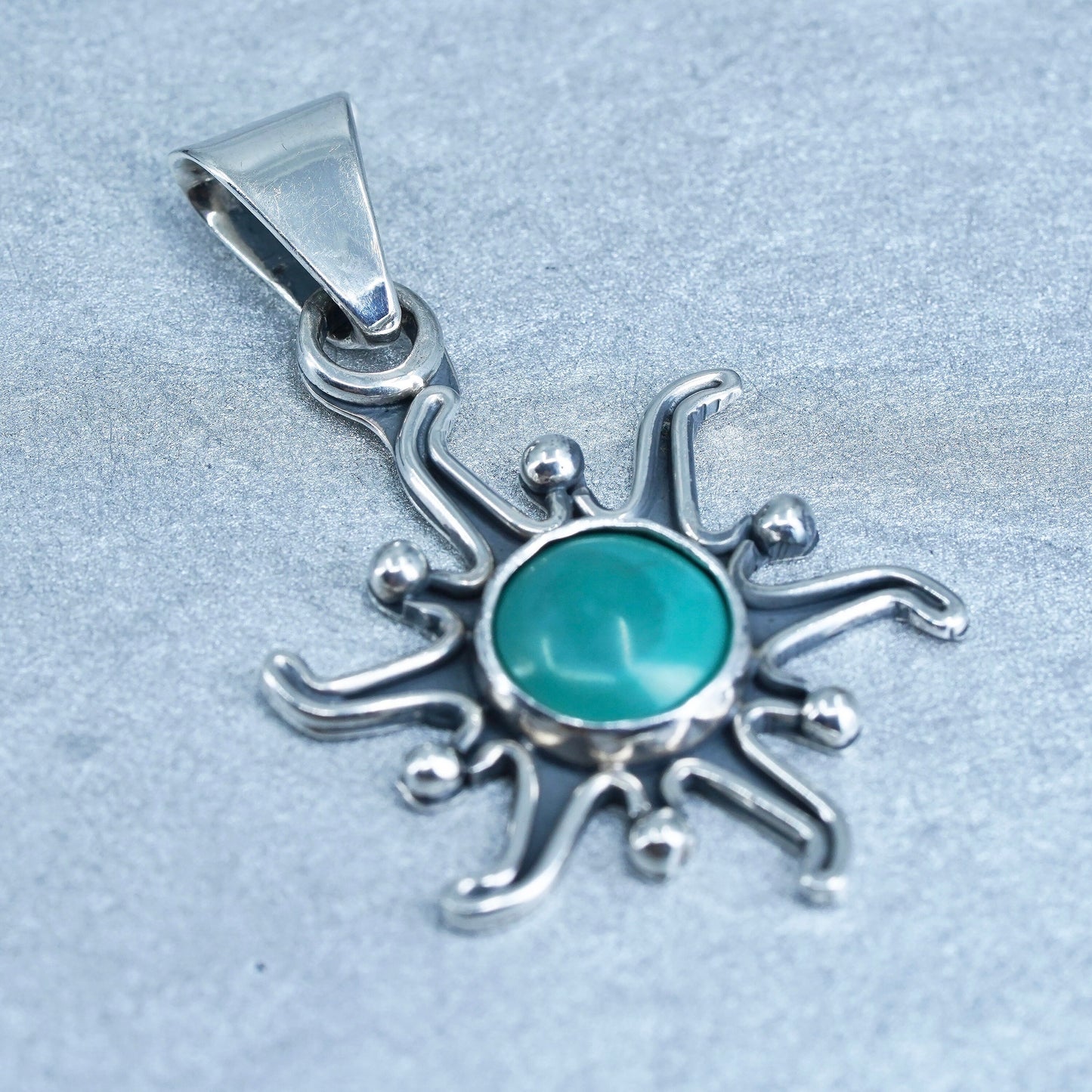 vintage Native American sterling 925 silver sun pendant with turquoise