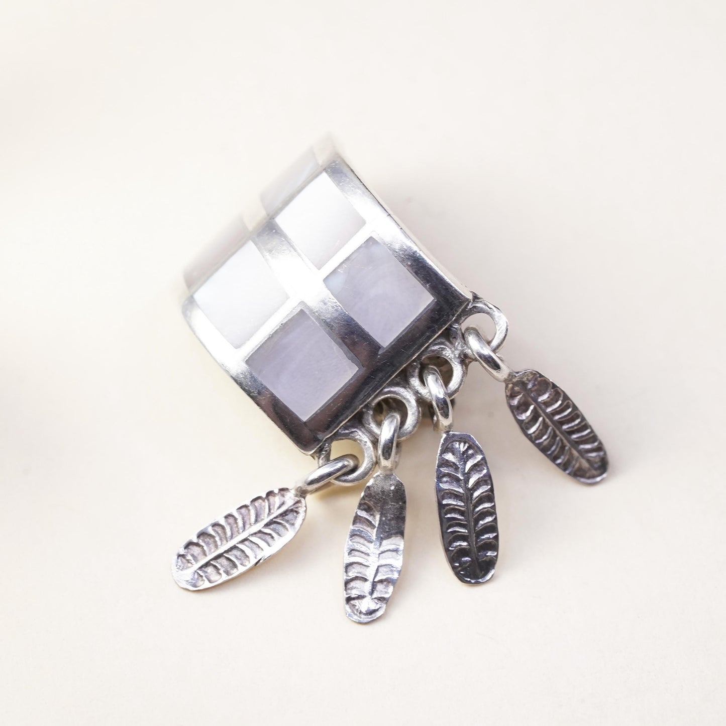 Mexican sterling silver single earring, 925 clip on w/ mother of pearl feather