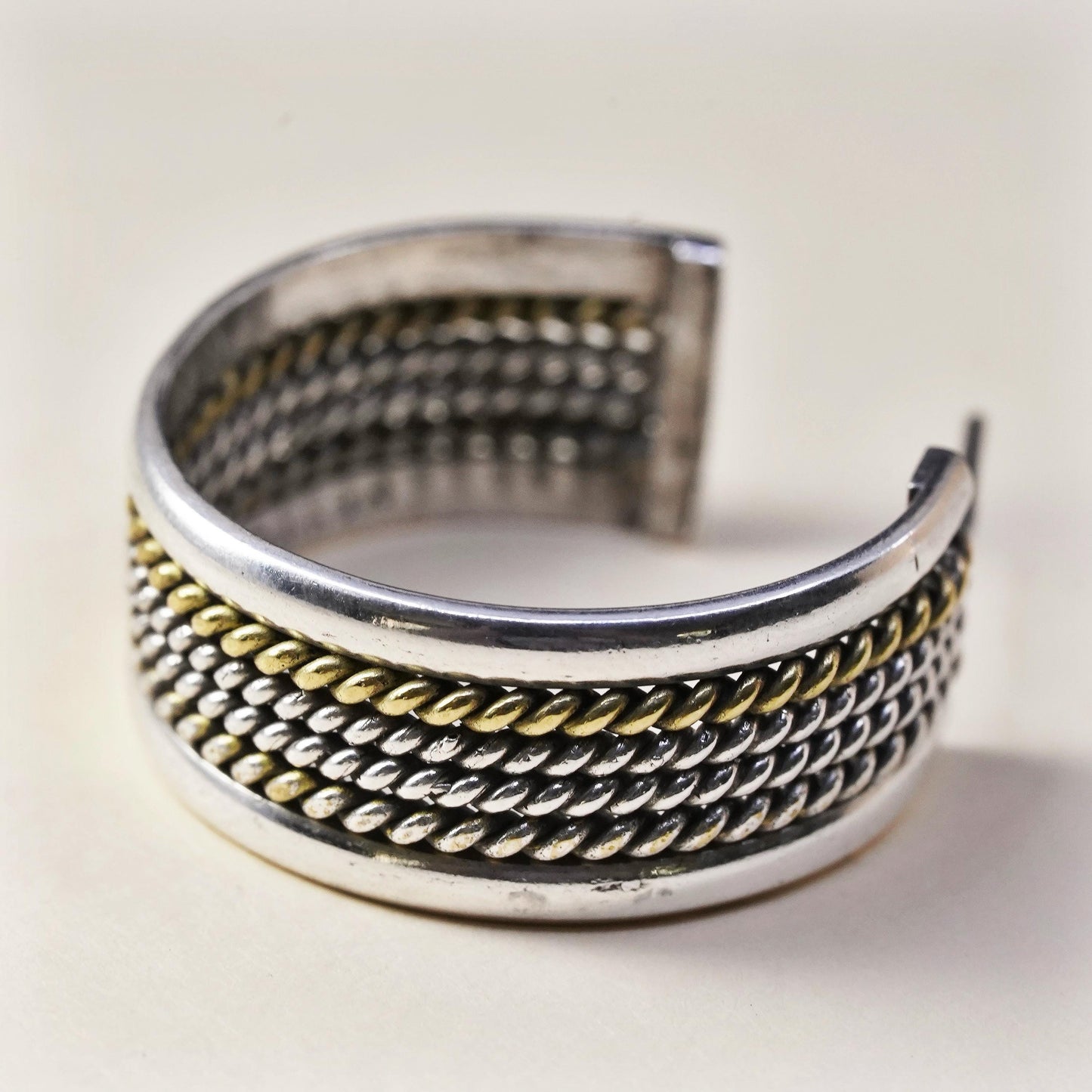 Vintage two tone Mexican single earring. Sterling 925 silver huggie stud
