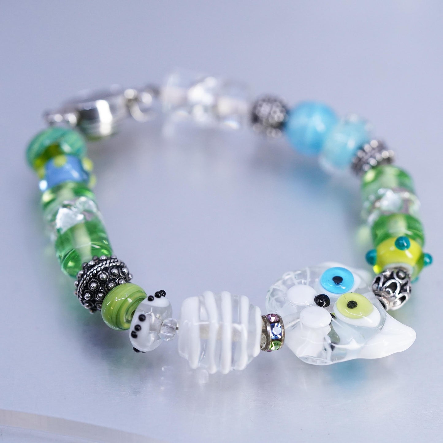 6.25", Mexico Sterling 925 Silver bracelet artisan green glass beads cat face