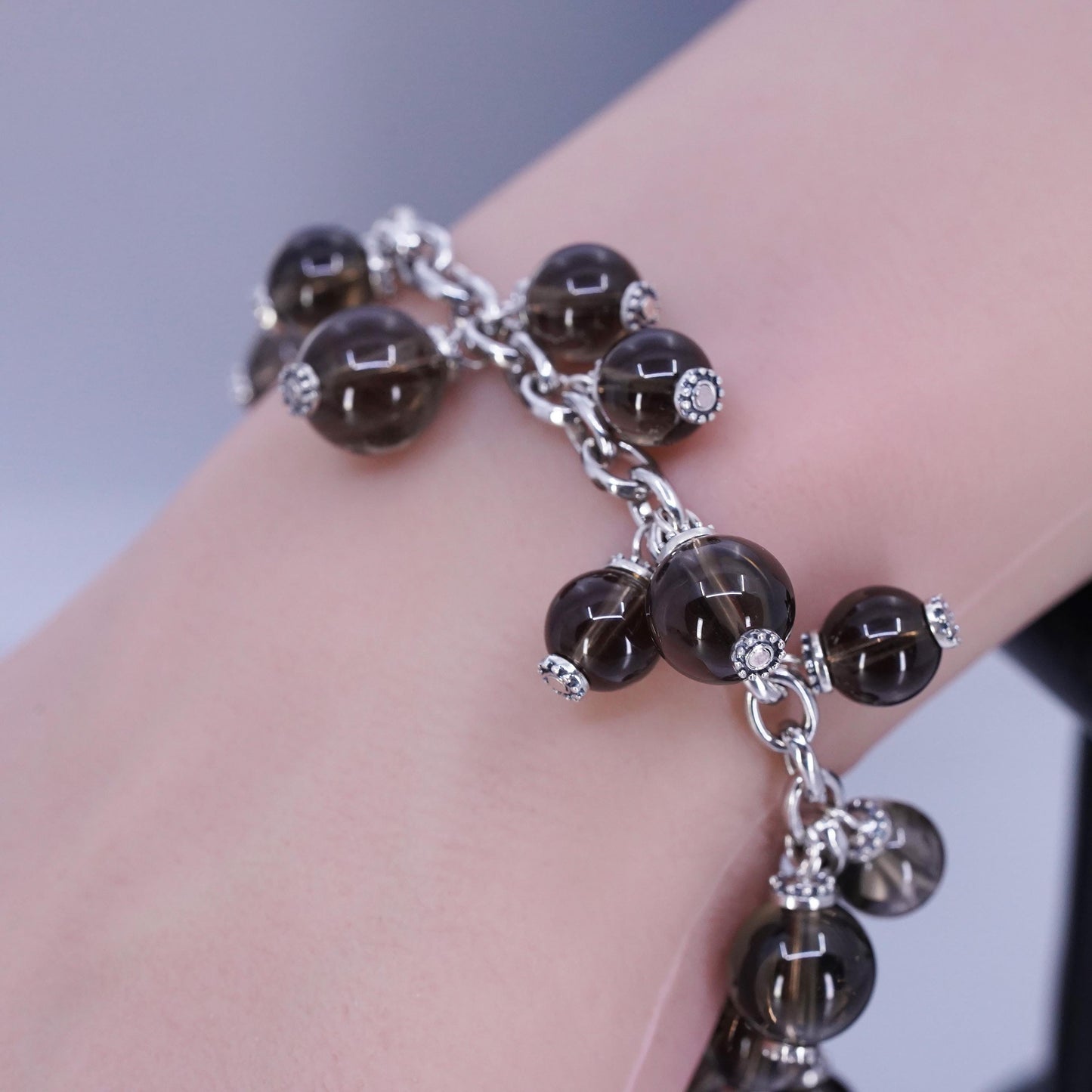 6.75”, Sterling 925 silver bracelet with smoky crystal beads and toggle closure