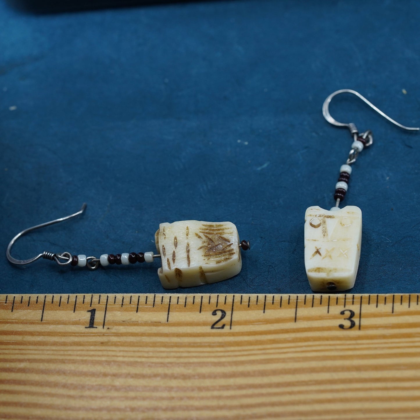 Vintage southwestern sterling silver handmade earrings with carved seed dangles