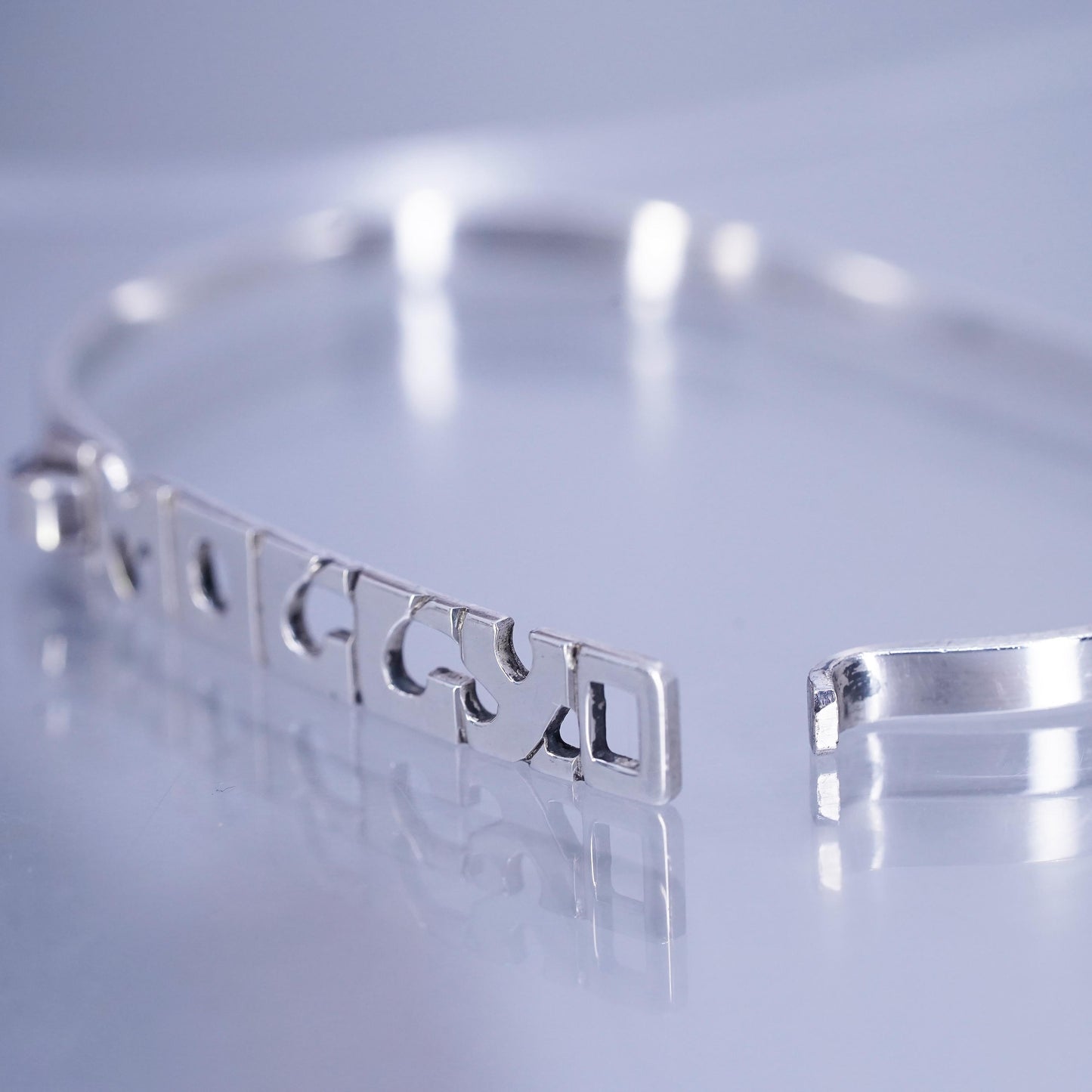 5.5”, Leonore Doskow 1970 Name Moccy Sterling 925 silver bracelet hinged bangle