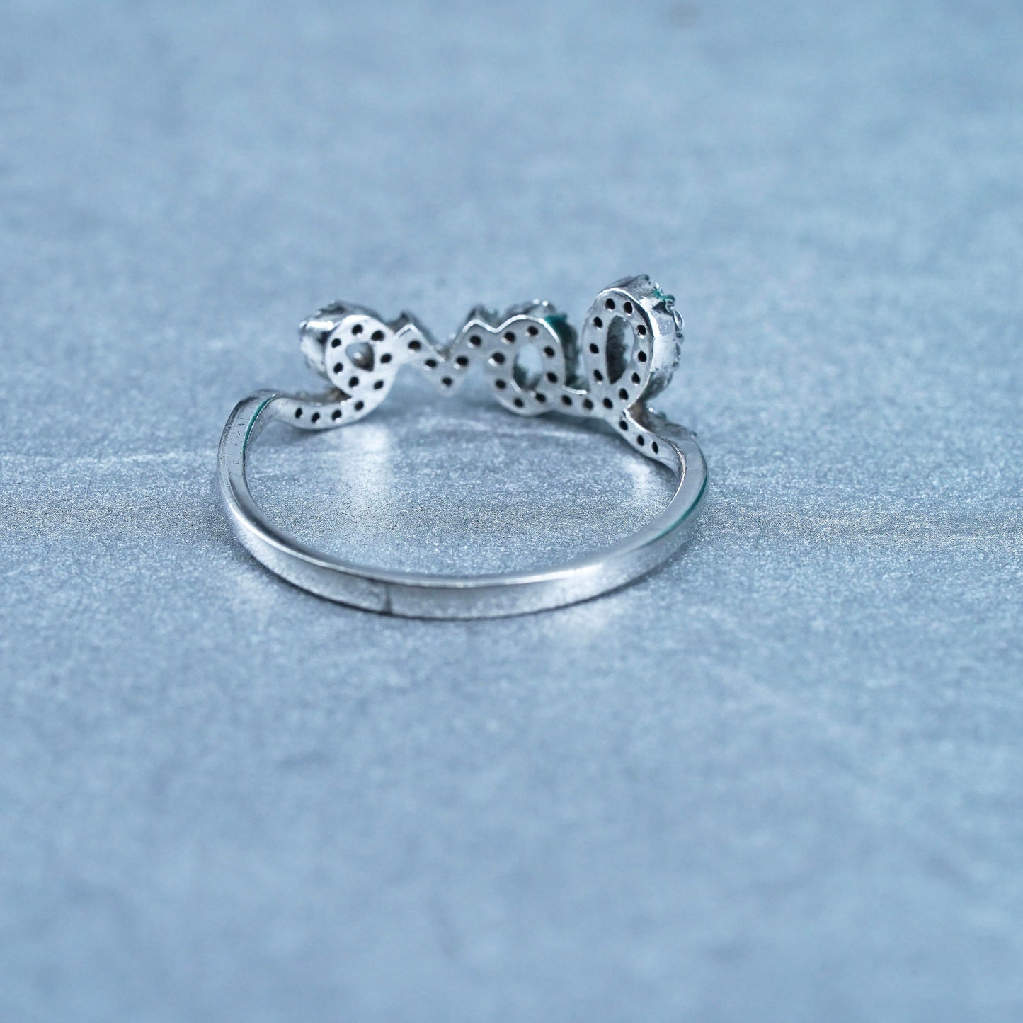 Size 8, southwestern Sterling 925 silver wedding ring, band with “love” and cz