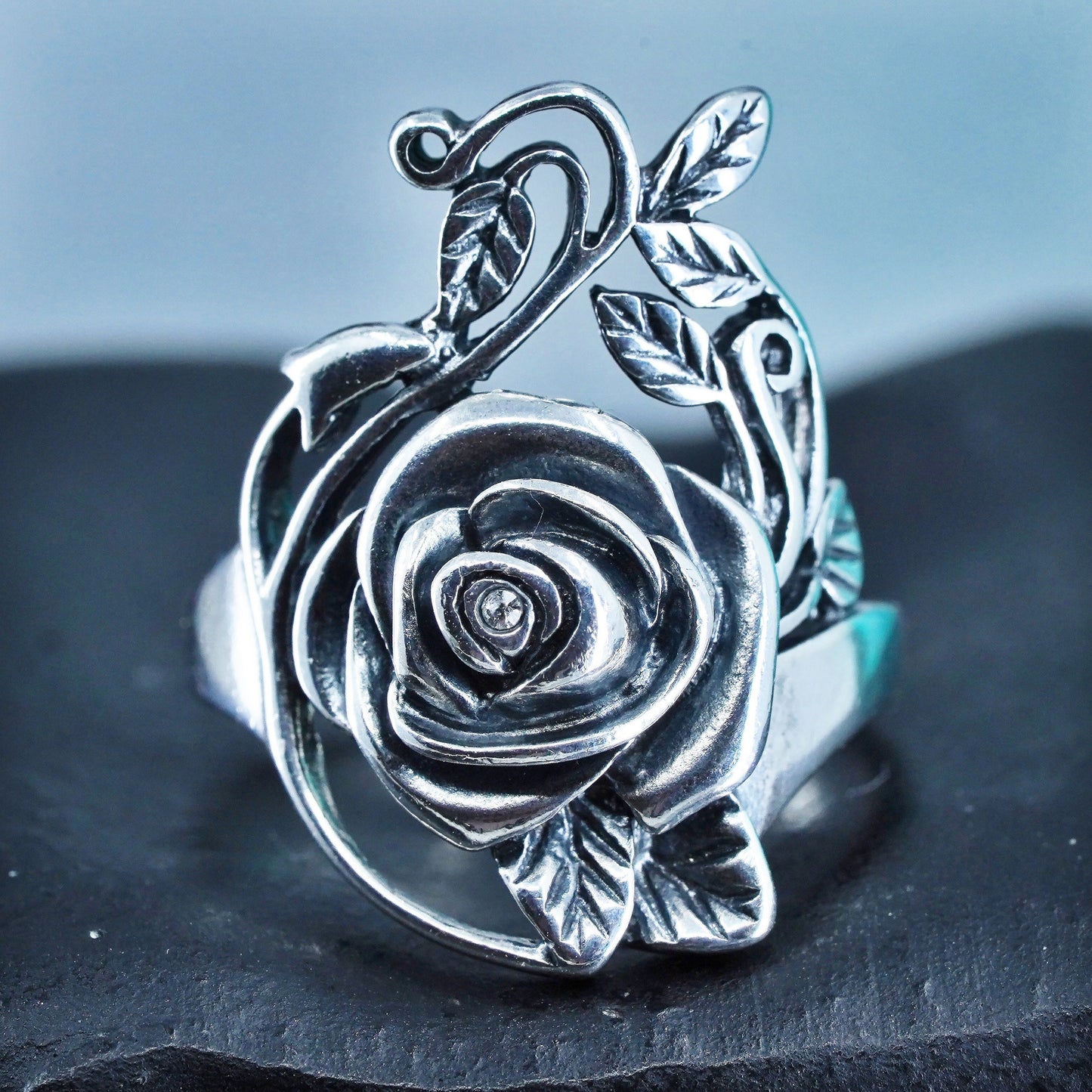 Size 7, vtg southwestern Sterling 925 silver handmade ring, flower band and Cz