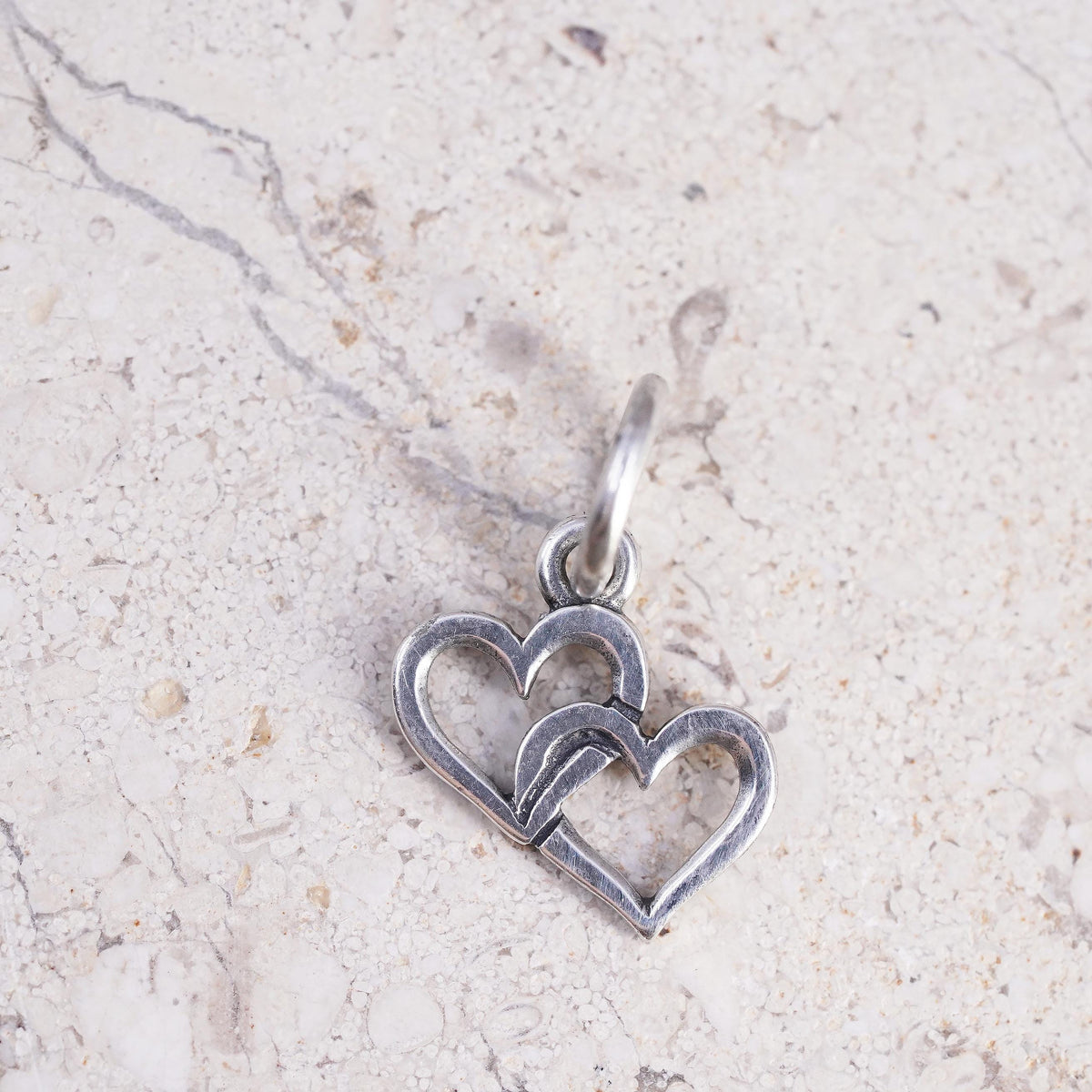 Vintage Retired James Avery sterling silver pendant, 925 linked hearts charm