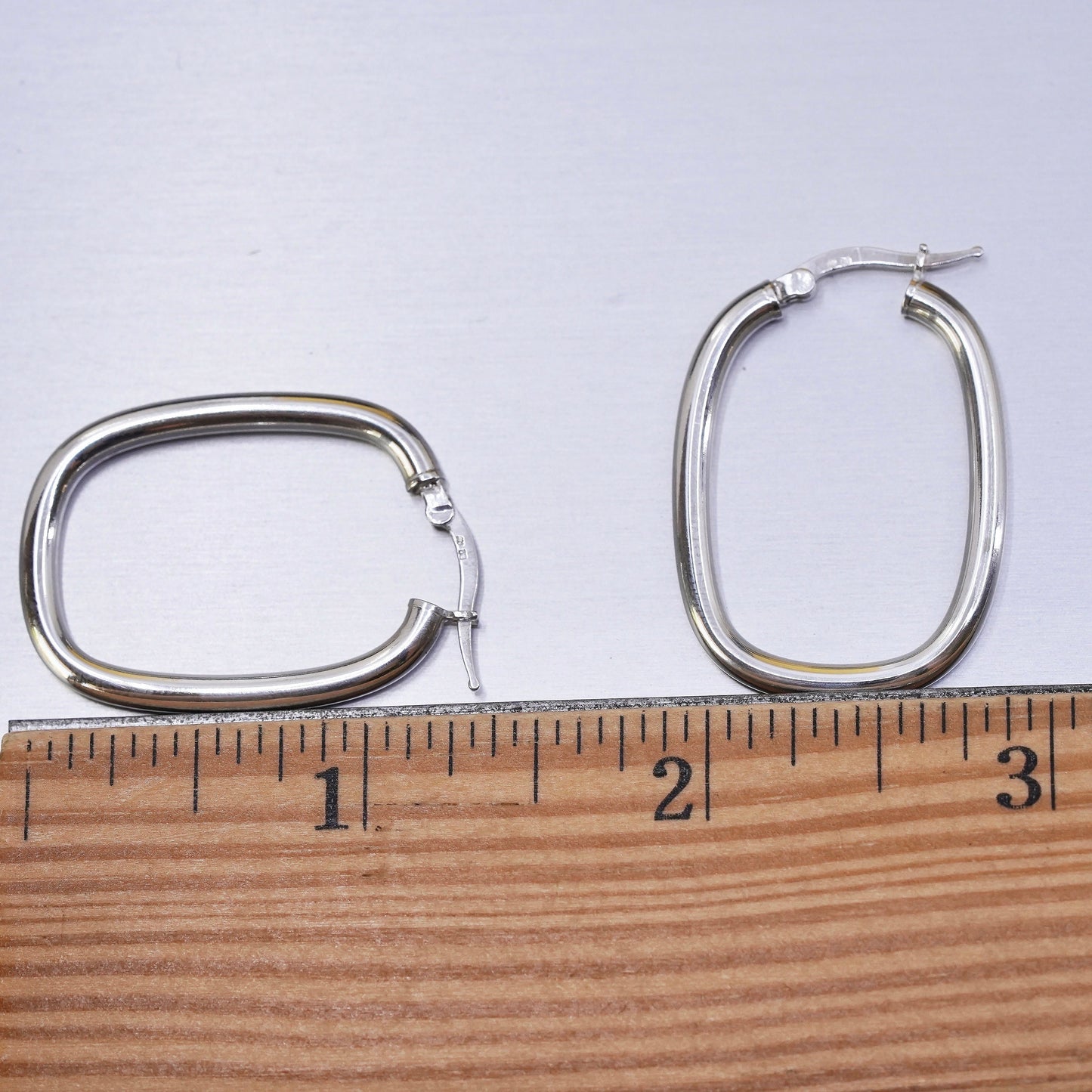 1.25", Sterling silver oval hoop earrings, textured 925 huggie