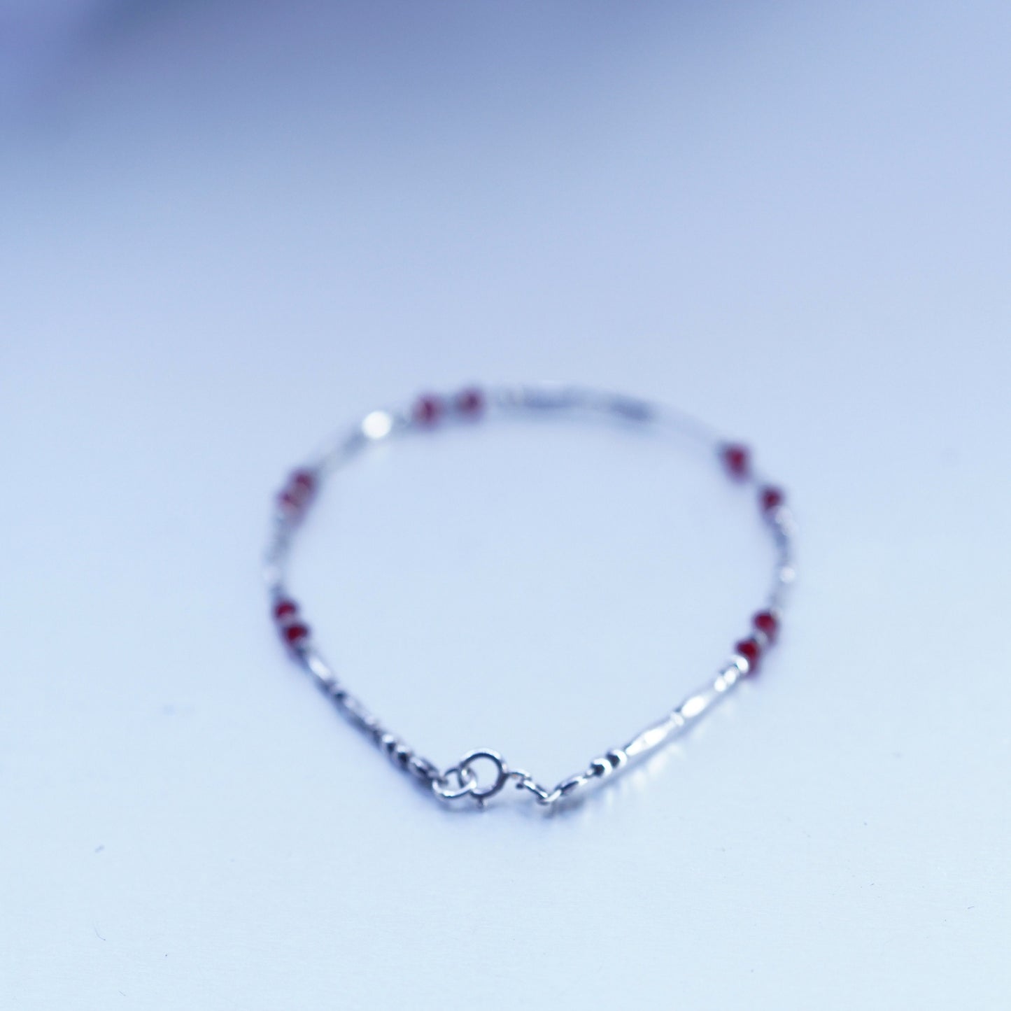 7.75”, Sterling 925 silver handmade bracelet, liquid chain with garnet charms