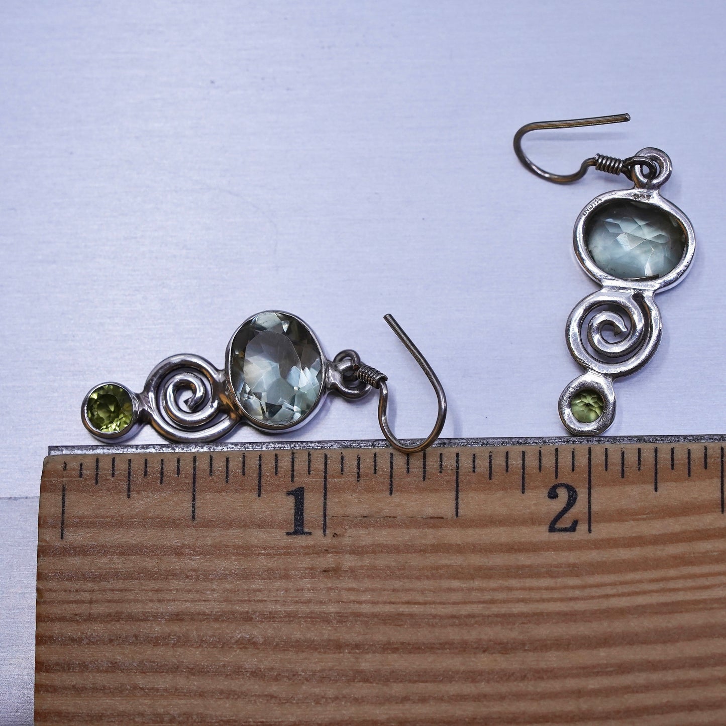 Vintage sterling 925 silver handmade earrings with peridot and spiral details