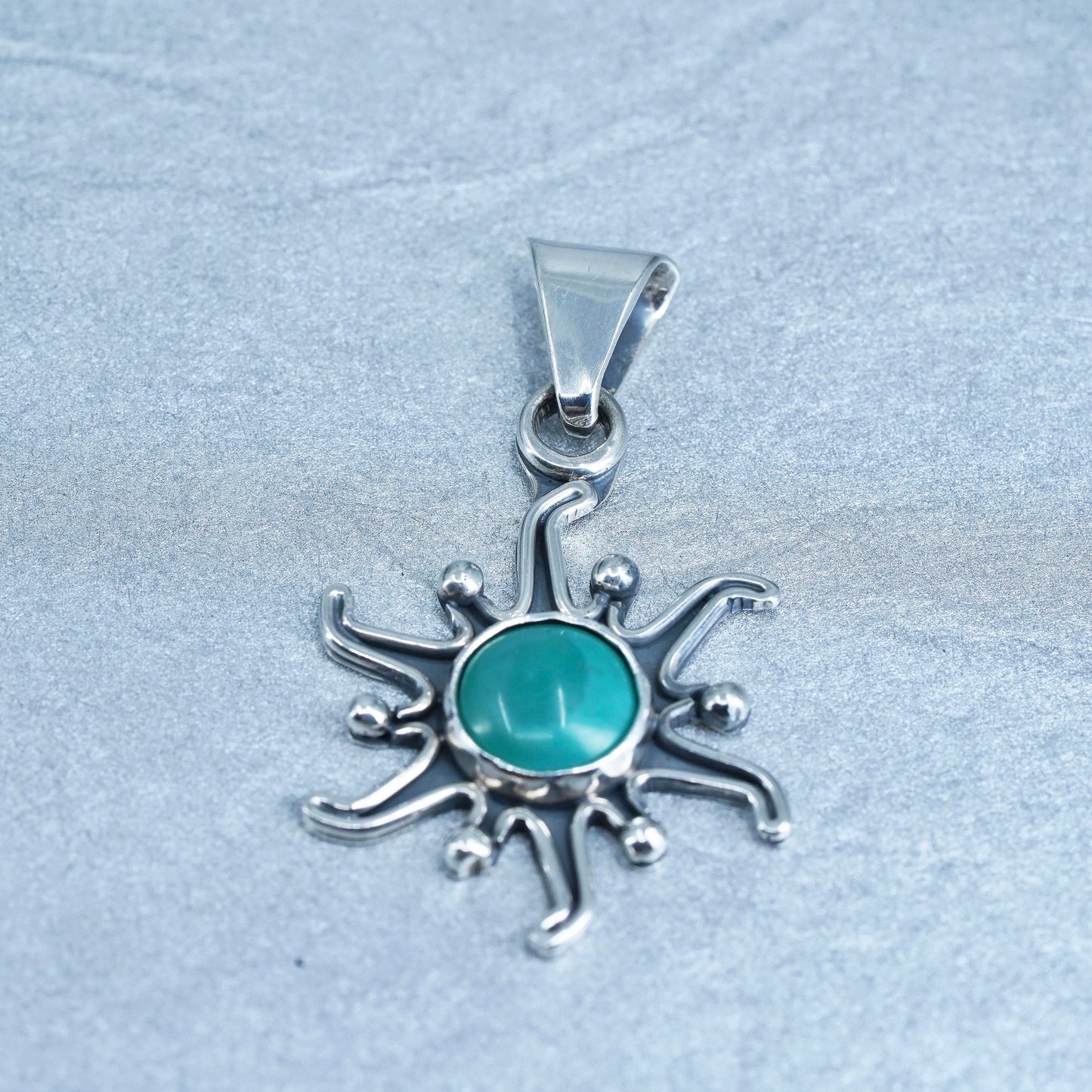 vintage Native American sterling 925 silver sun pendant with turquoise