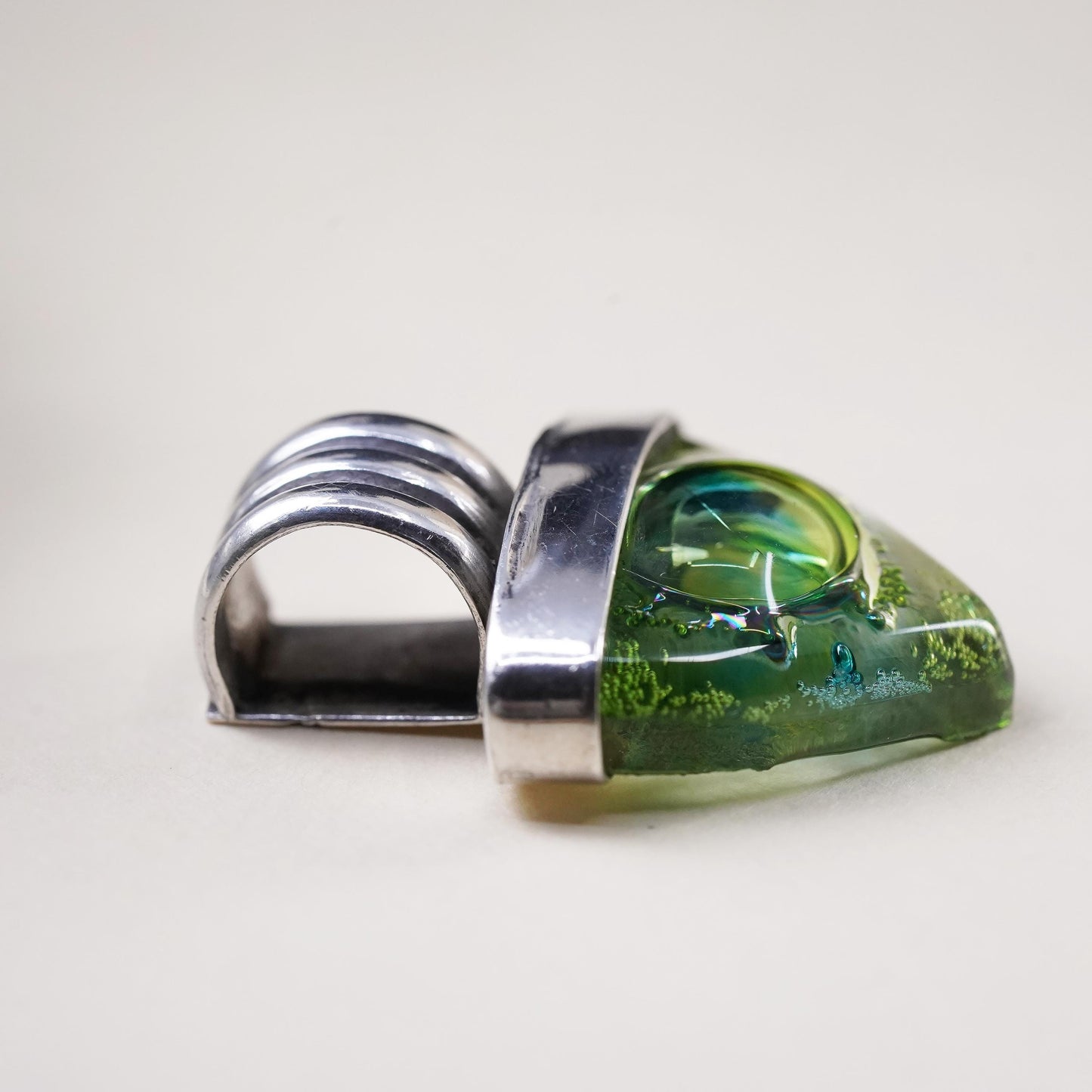 Vintage sterling silver with triangular green dichroic foiled glass pendant