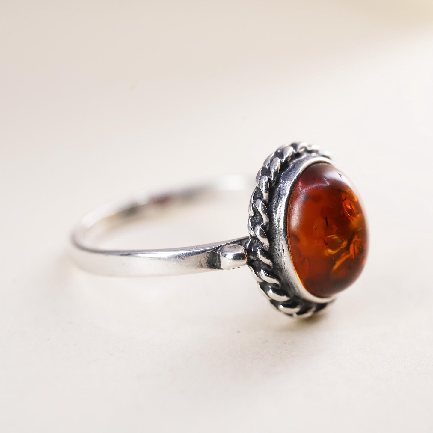 Size 5, Vintage sterling 925 silver handmade ring with Amber and cable around
