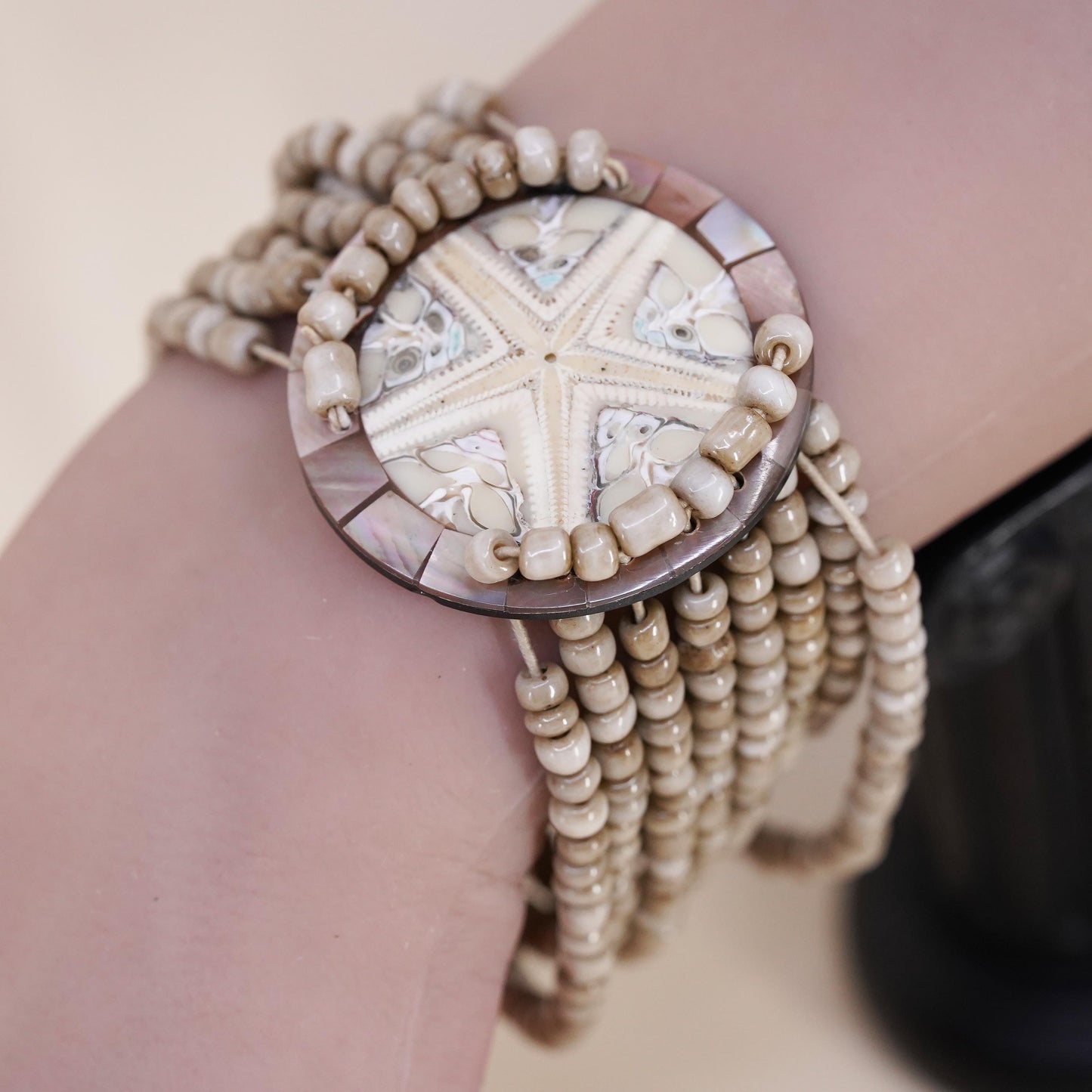 8", Vintage stretchy band, multi strands bead bracelet fossilized sand dollar