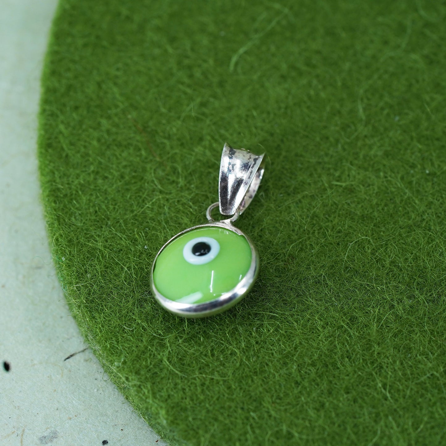 Vintage Mexico sterling silver with handmade green evil eye glass pendant