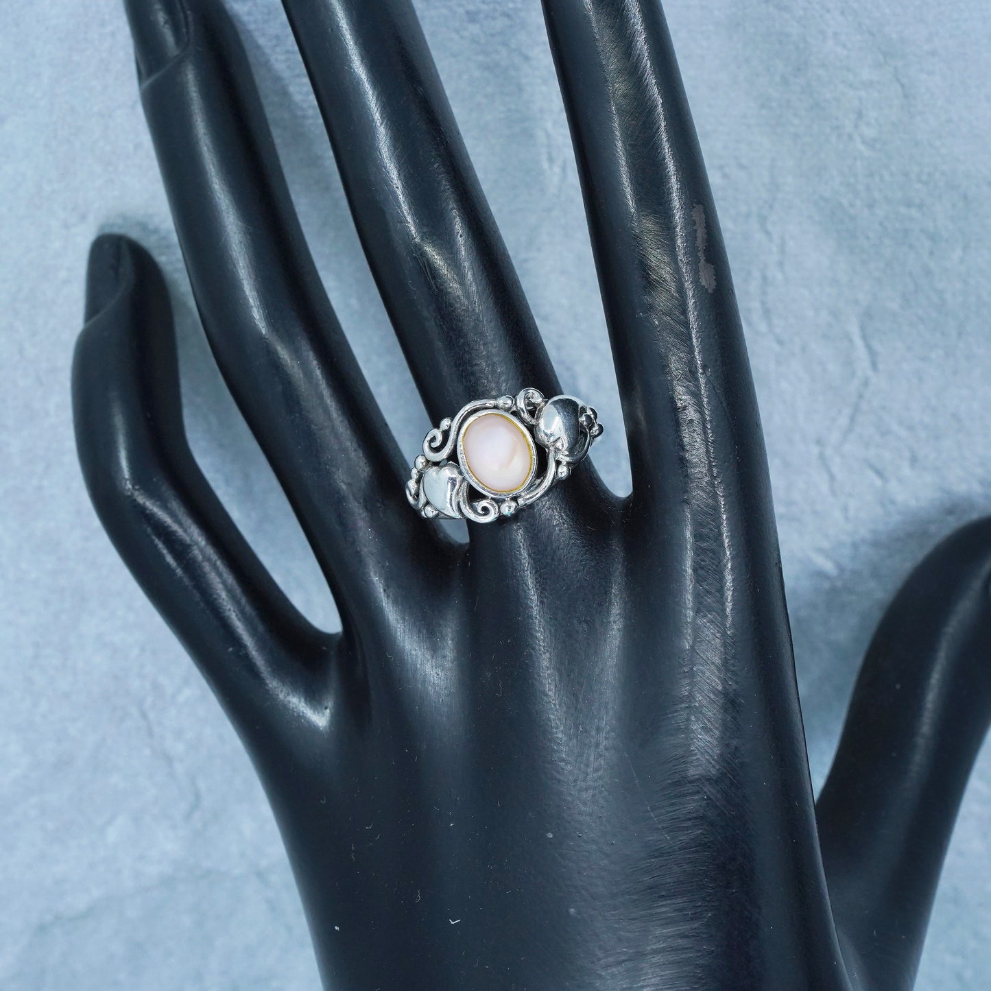Size 8.25, Sterling 925 silver ring with pink mother of pearl and hearts around