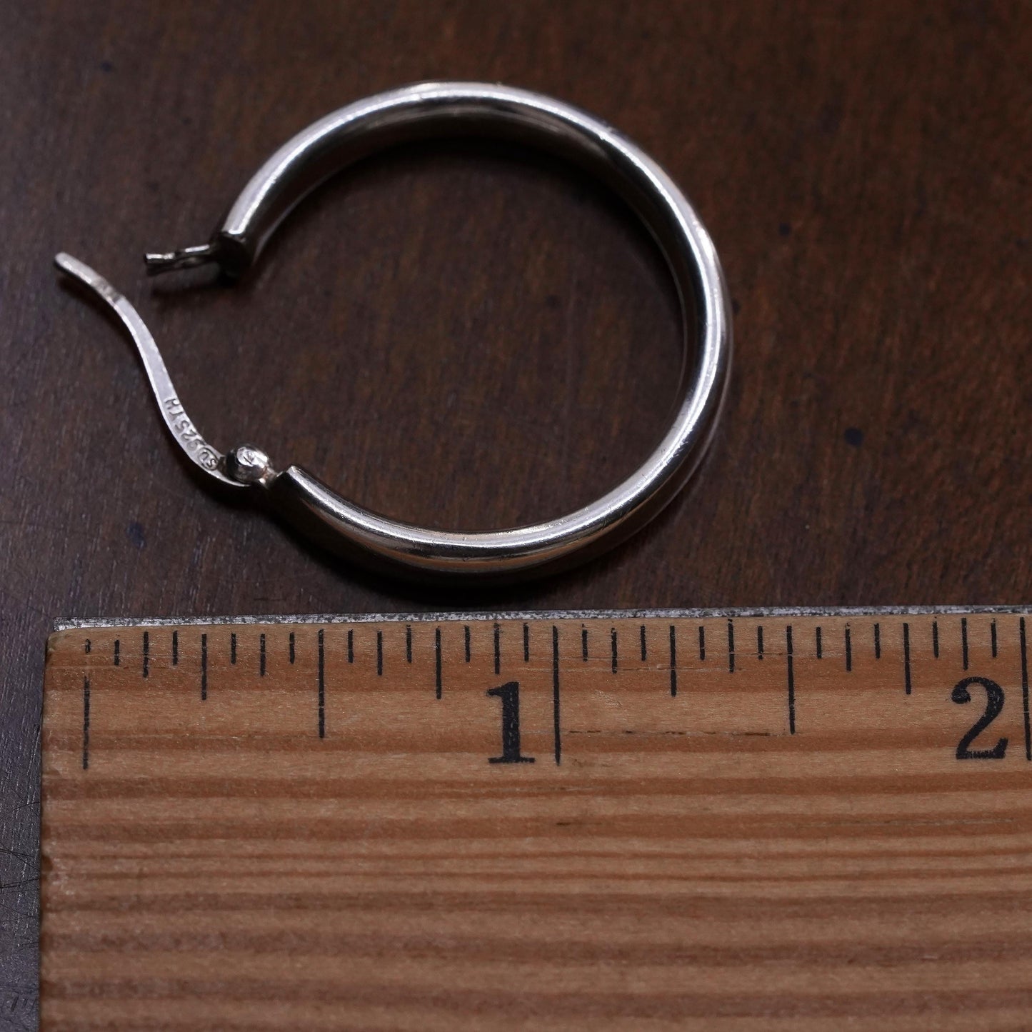 1.25” sterling silver loop single earring, textured minimalist primitive hoop