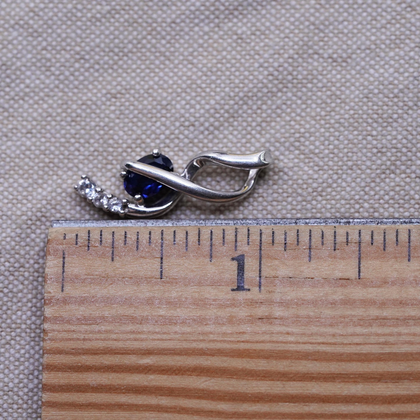 Vintage Sterling 925 silver handmade pendant with sapphire and Cz around