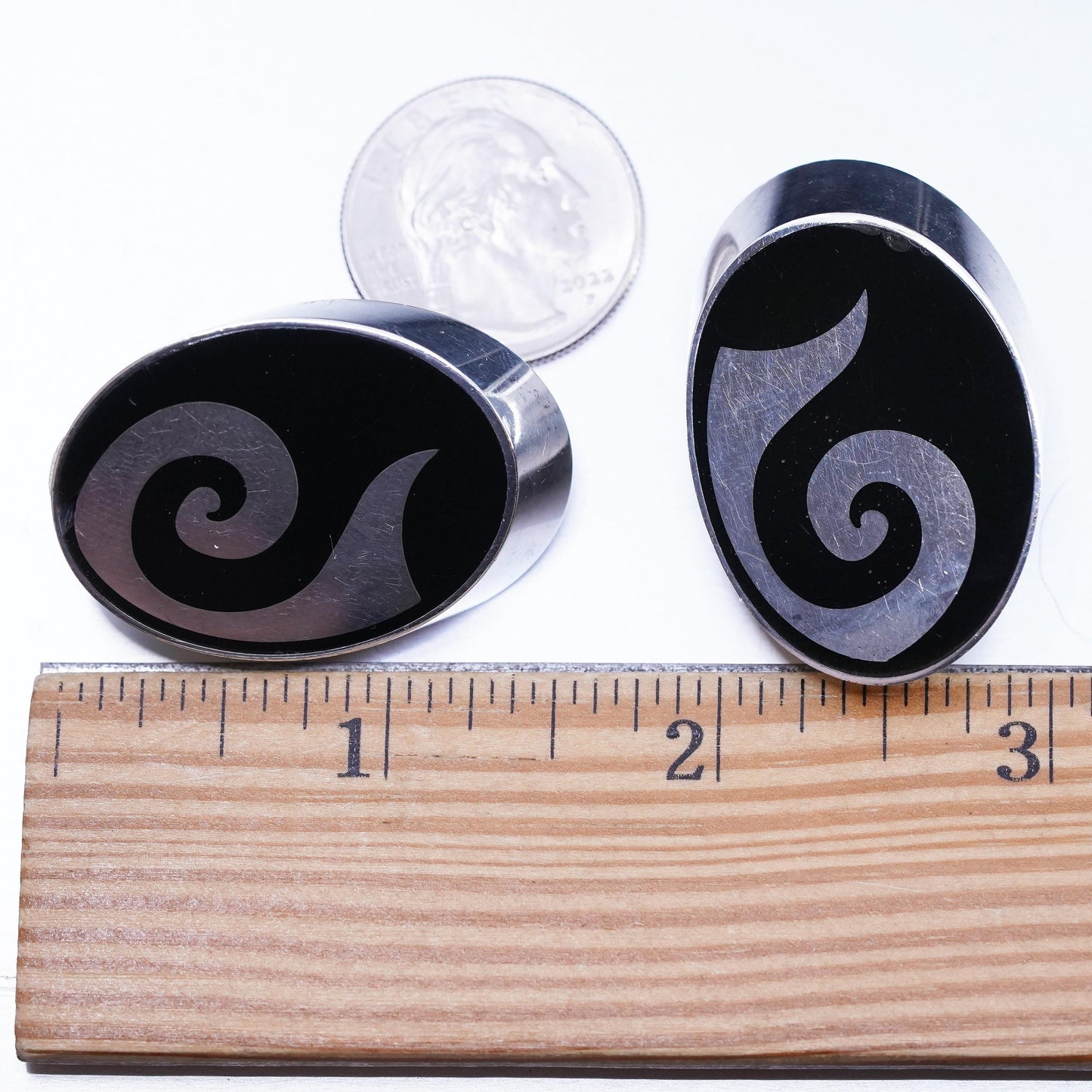 Vintage Varga Sterling Silver Oval Clip On Earrings with onyx and spiral inlay