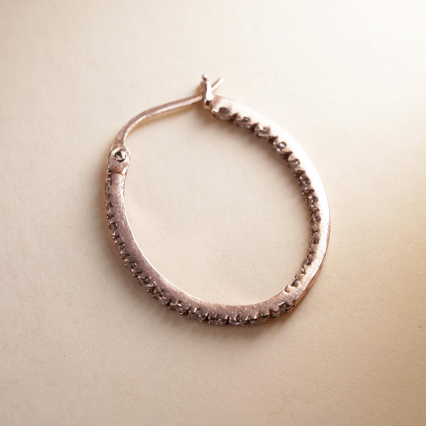 0.75", rose gold over sterling silver loop single earring, primitive hoop cz