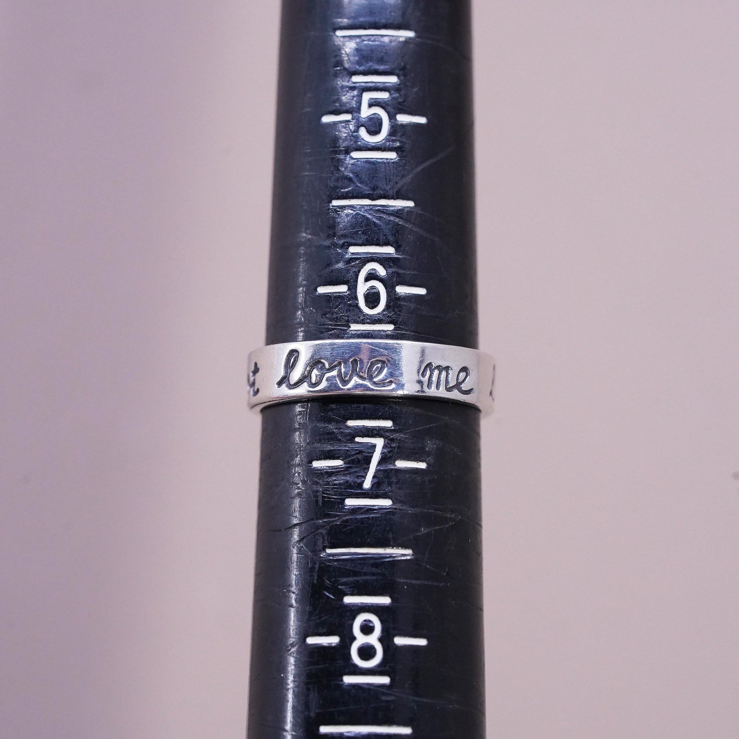 Size 6.25, VTG Sterling silver stackable ring, 925 band engraved "love me not"