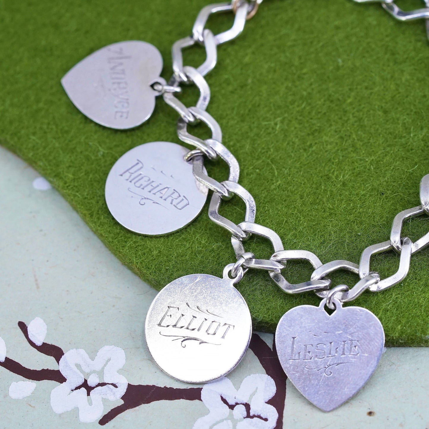 6.75" sterling silver bracelet, 925 curb link chain with charms embossed names