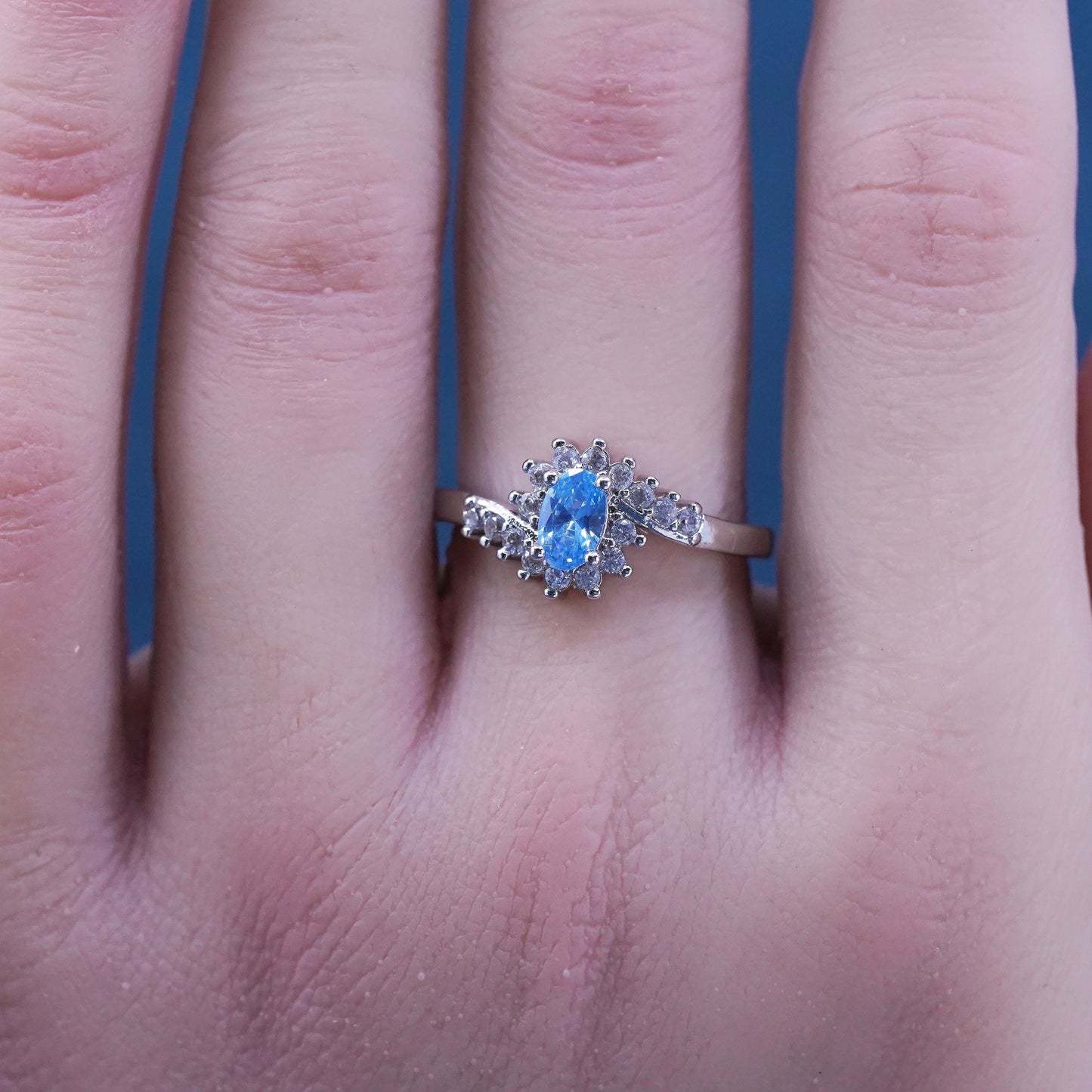 Size 7, vintage sterling 925 silver handmade ring with blue topaz and cz around