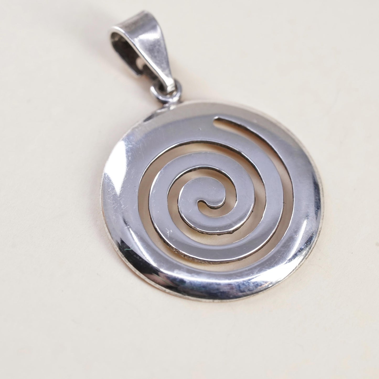 Vintage handmade Sterling silver pendant, 925 circle tag with spiral cut out