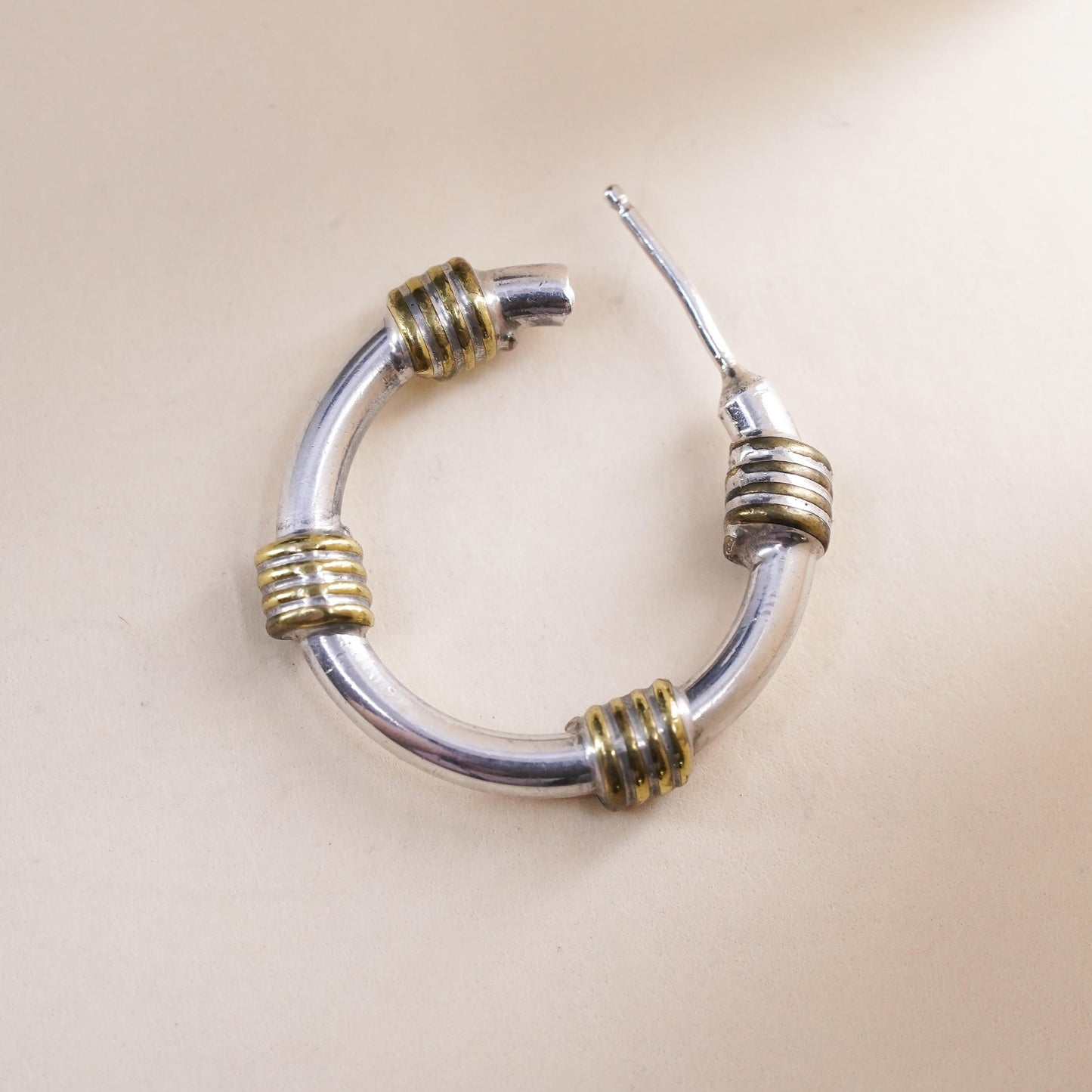 Vintage two tone Mexican single earring. Sterling 925 silver huggie stud