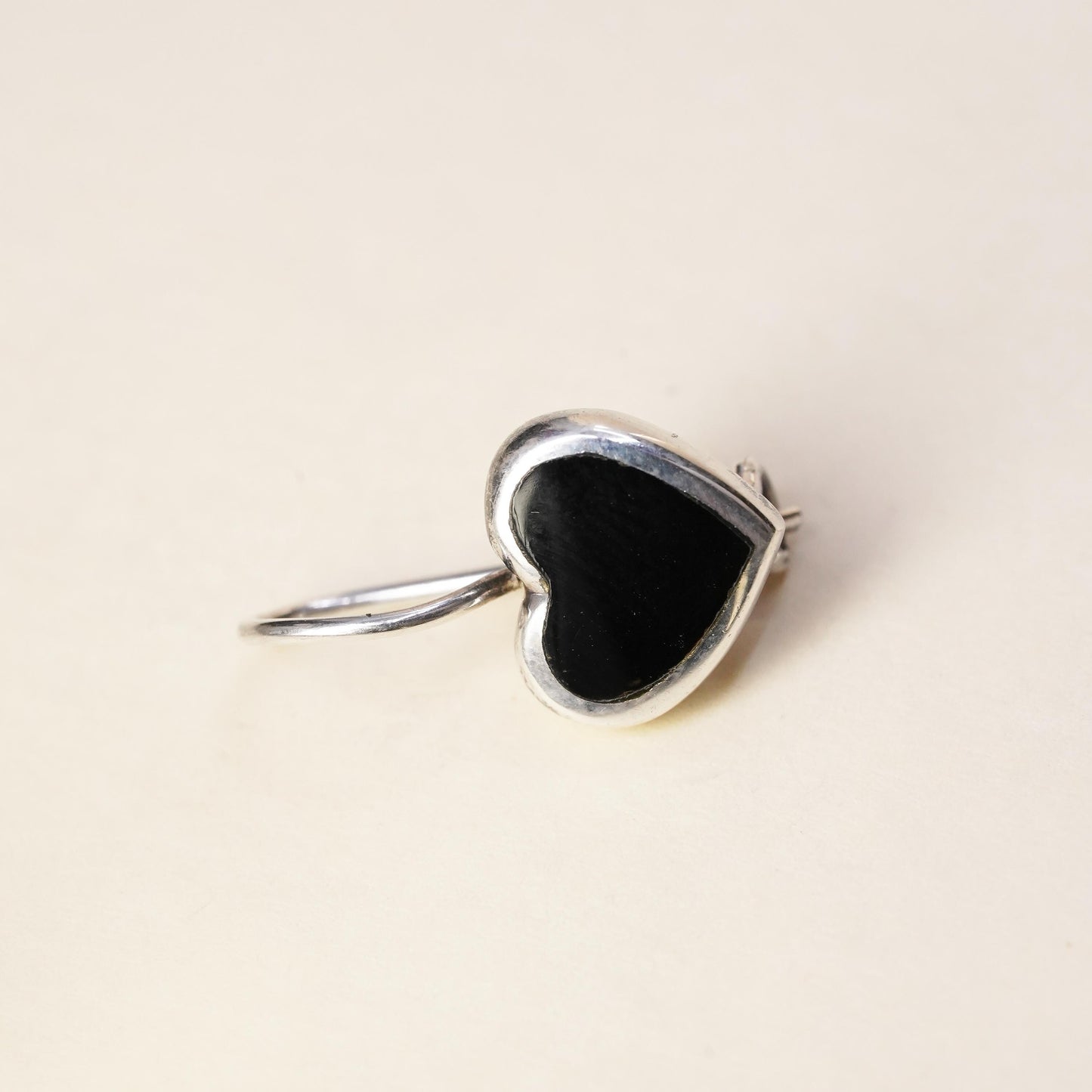 Vintage handmade single earring. Sterling 925 silver heart with onyx inlay