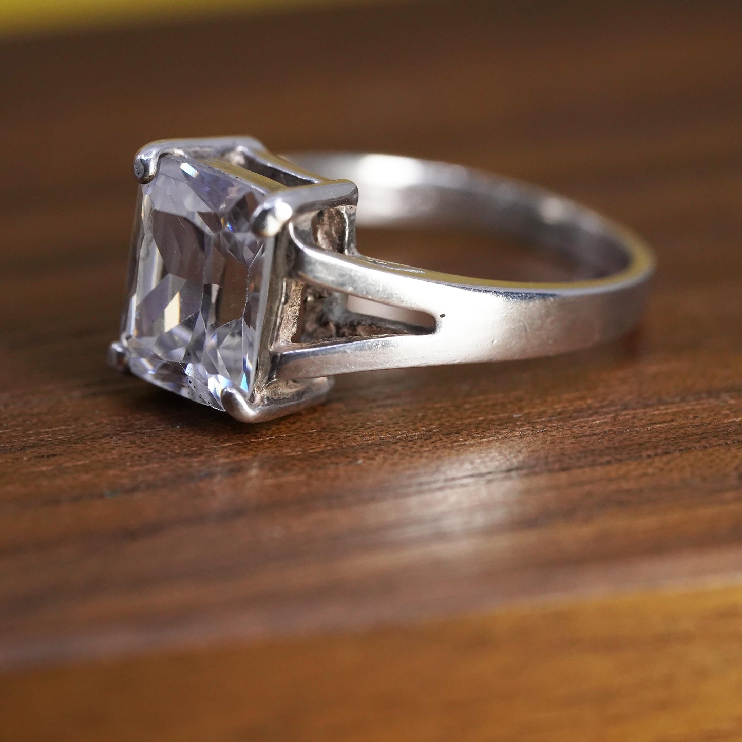Size 7, vintage Sterling 925 silver anniversary ring with clear emerald cut cz