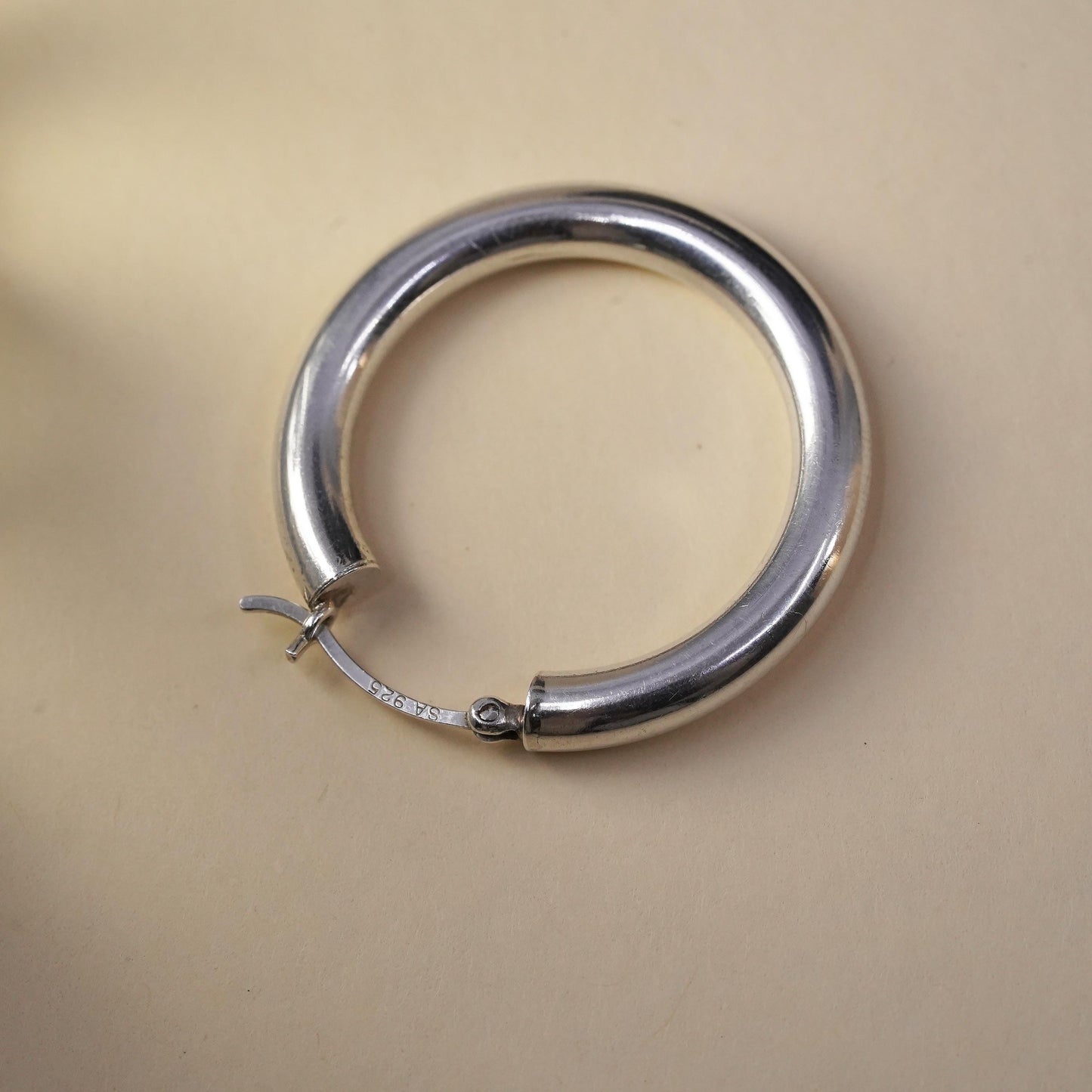 1.25” Vintage sterling silver loop single earring, textured primitive hoop