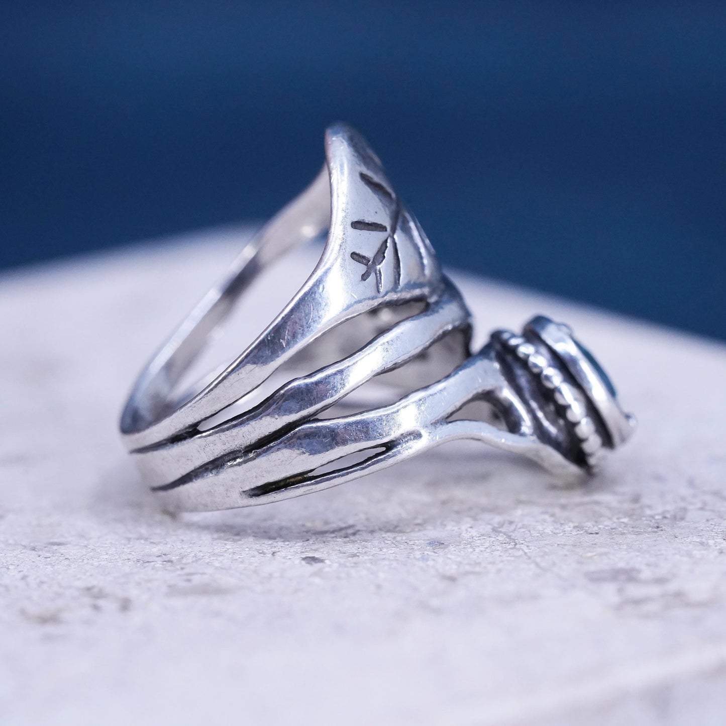 Size 8, vintage Israel Shablool Didae Sterling silver wavy ring with blue topaz