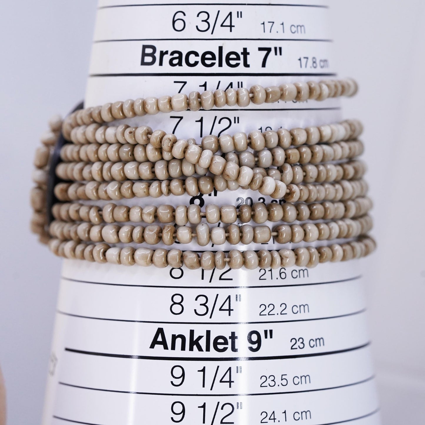 8", Vintage stretchy band, multi strands bead bracelet fossilized sand dollar