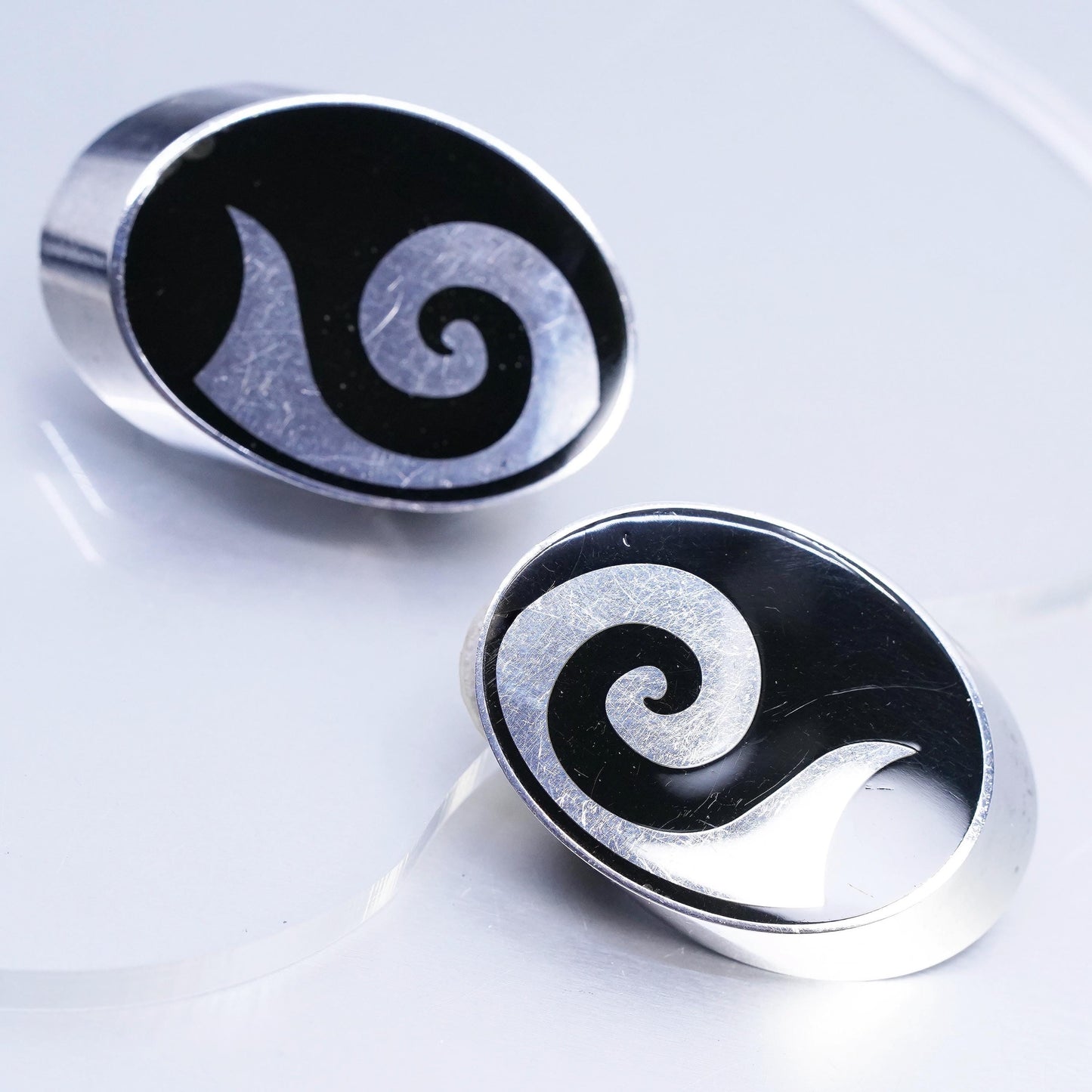 Vintage Varga Sterling Silver Oval Clip On Earrings with onyx and spiral inlay