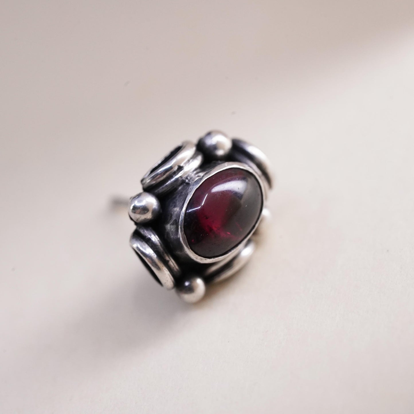 Vintage handmade single earring. Sterling 925 silver stud with garnet