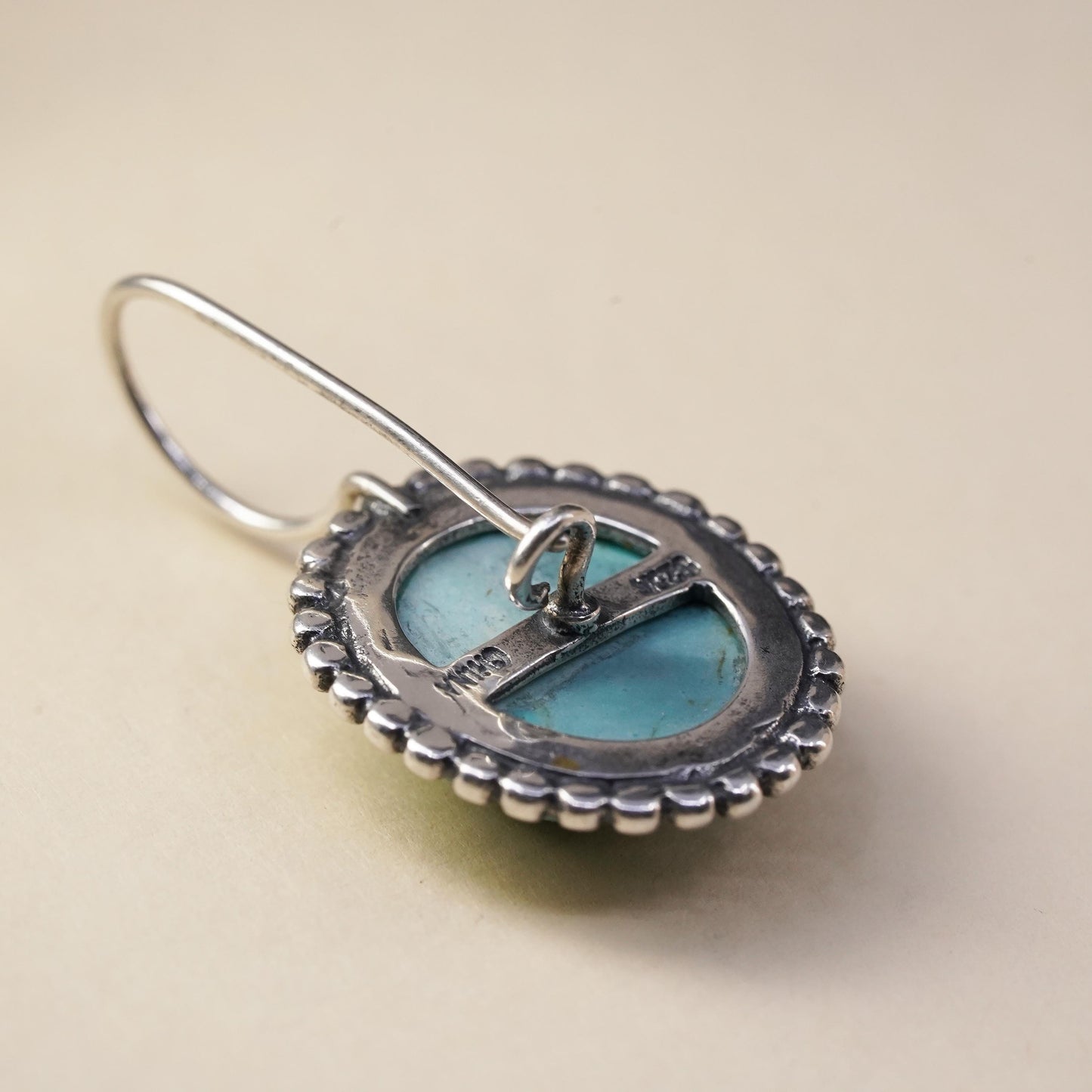 Vintage southwestern sterling 925 silver single earring with carved turquoise