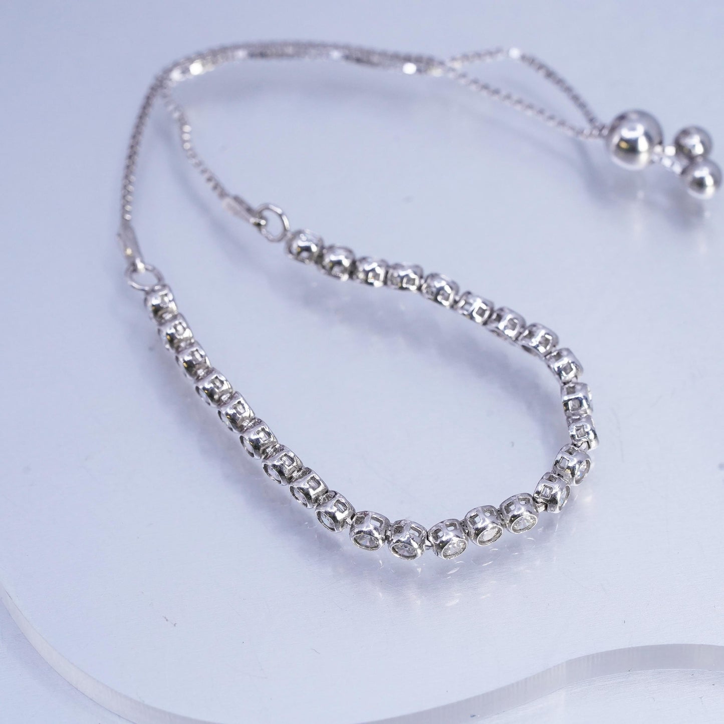 Size adjustable. Sterling 925 silver tennis bracelet, box chain cluster cz bar